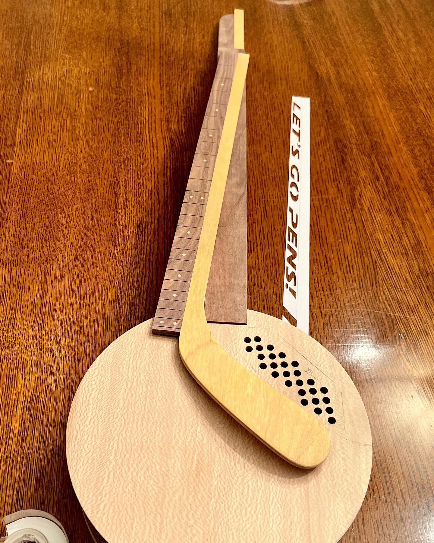 Pittsburgh Penquins guitar in progress.  #hockey #pittsburgh #pittsburghpenguins #guitar #handmade #woodworking #threestringguitar #gbgitty #stewmac #klingspor #grover #gdg #pnc