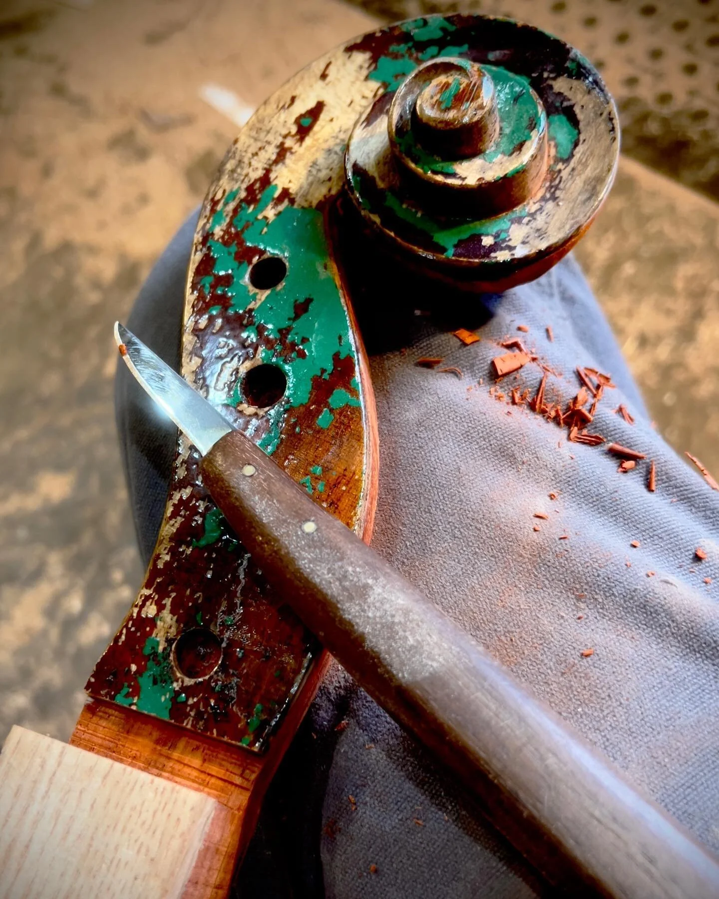 A work in progress. Thanks for the bass pegbox, Fred. #homemadeguitar #cigarboxnation #carving #cbgitty #stewmac #americanchesnut #recycledwood #mailpouchtobacco