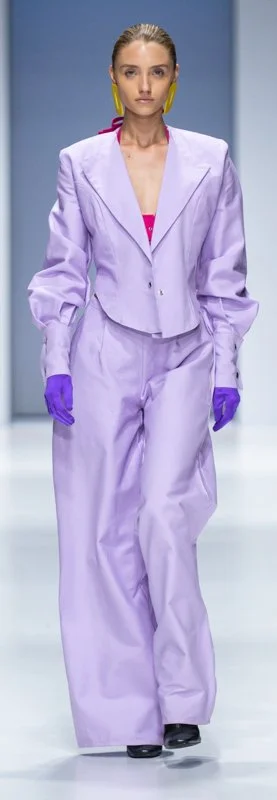 Model in lavender suit on runway