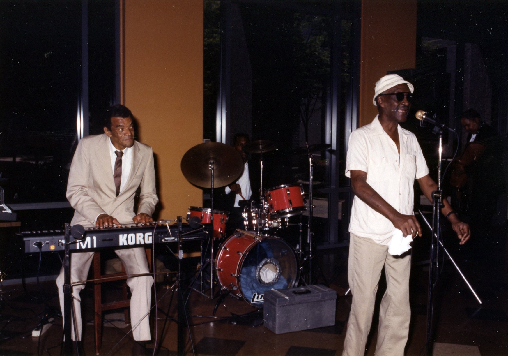 Bus Brown and Yusuf in performance.