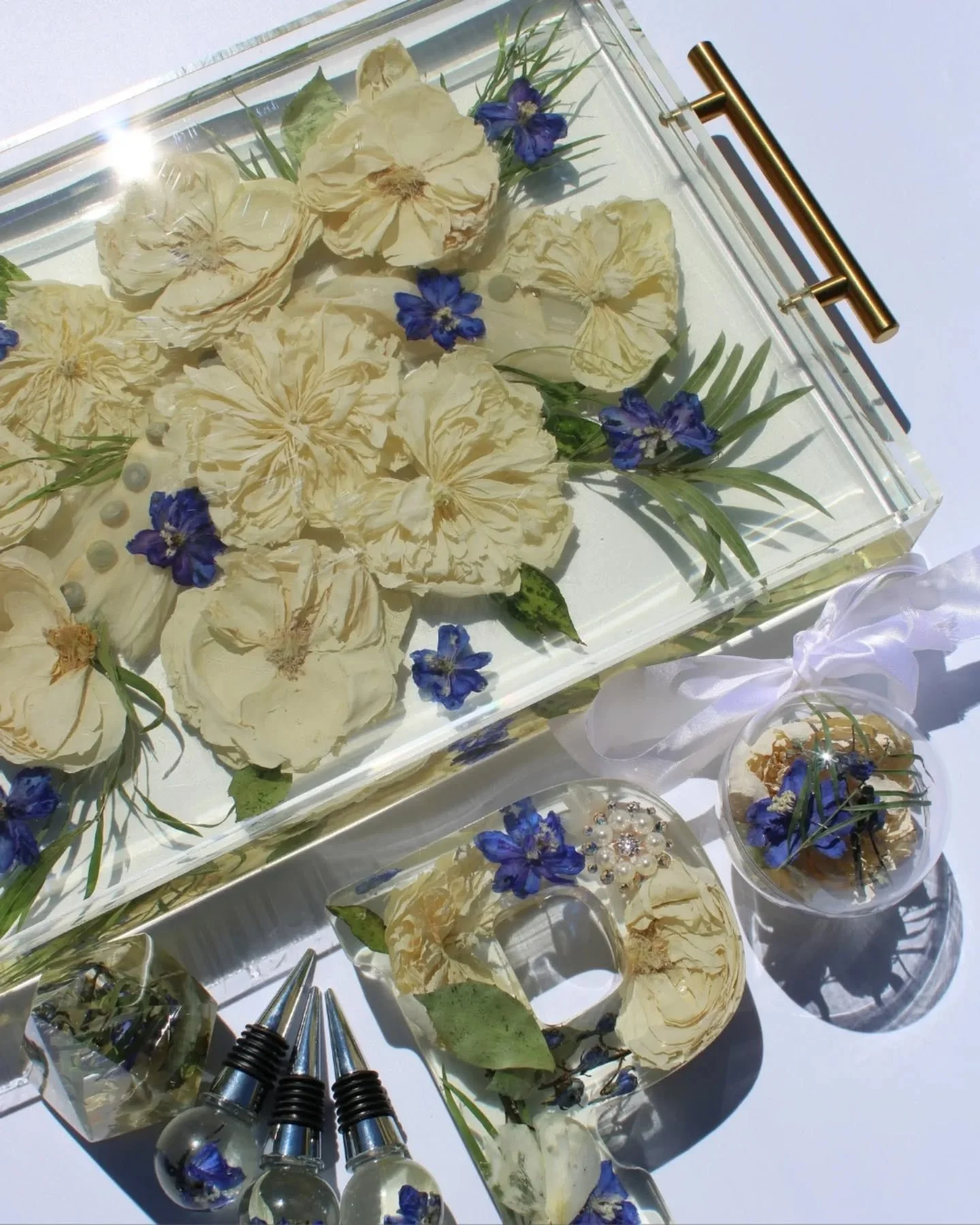 One bouquet.
Many forever pieces. 💐

A tray, letter block, ring holder, ornament, and wine stoppers... all made from the same preserved flowers.

Your bouquet doesn't have to fade away. Preserve yours now. Link in bio.

#flowerpreservation #preserve