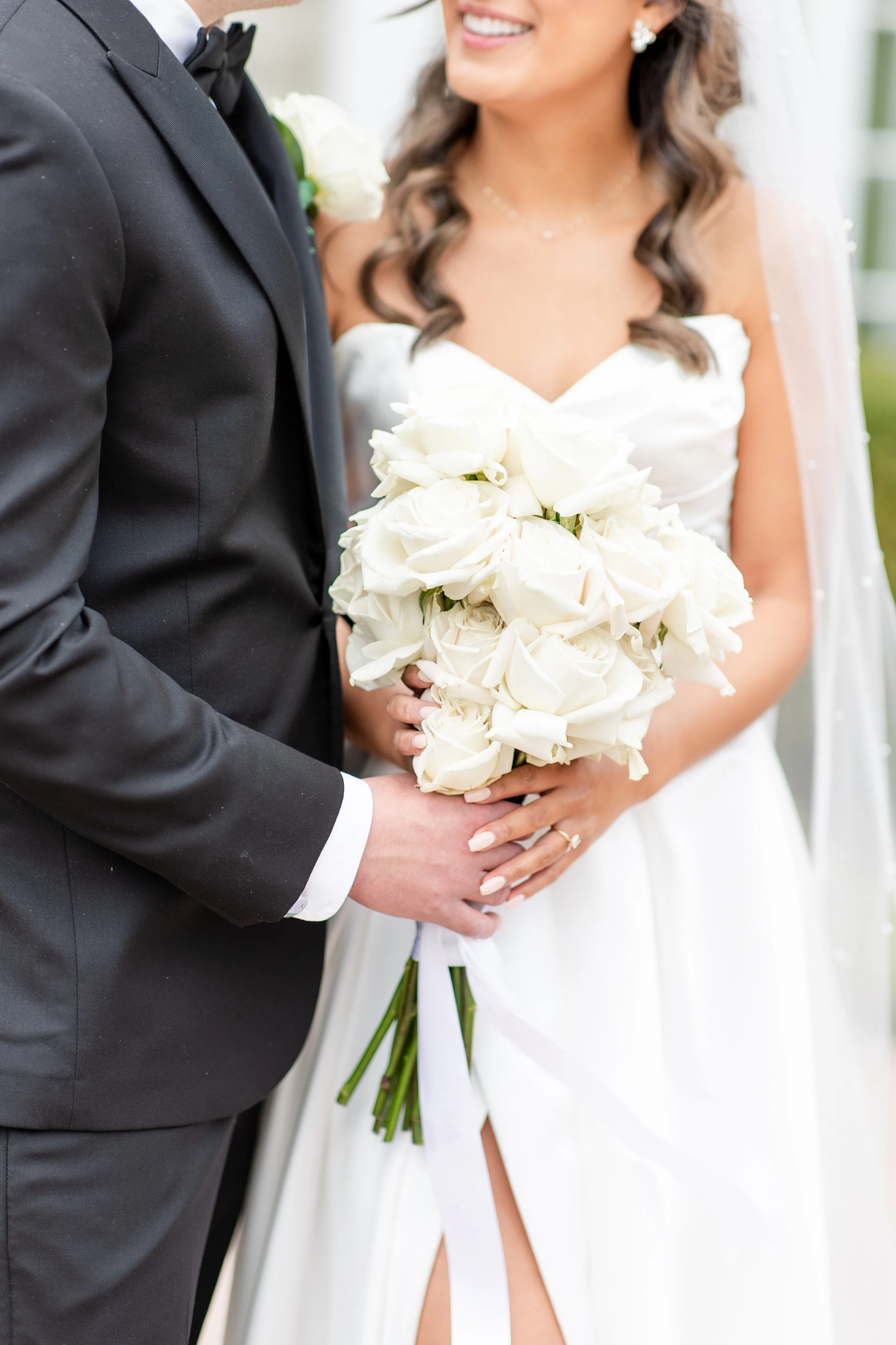 Closeup bride and groom holding bouquet wedding photo by Jessica Anne Photography, NJ wedding photographer.