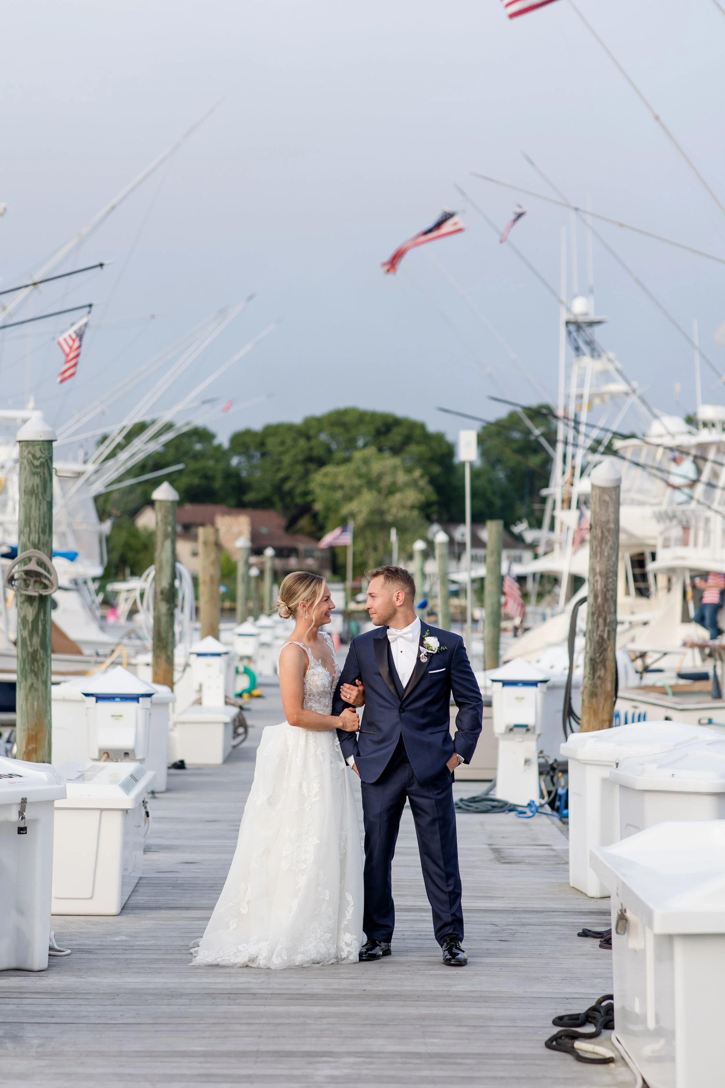Romantic dock wedding photo at Crystal Point Yacht Club in Point Pleasant, NJ. Shot by Jessica Anne Photography