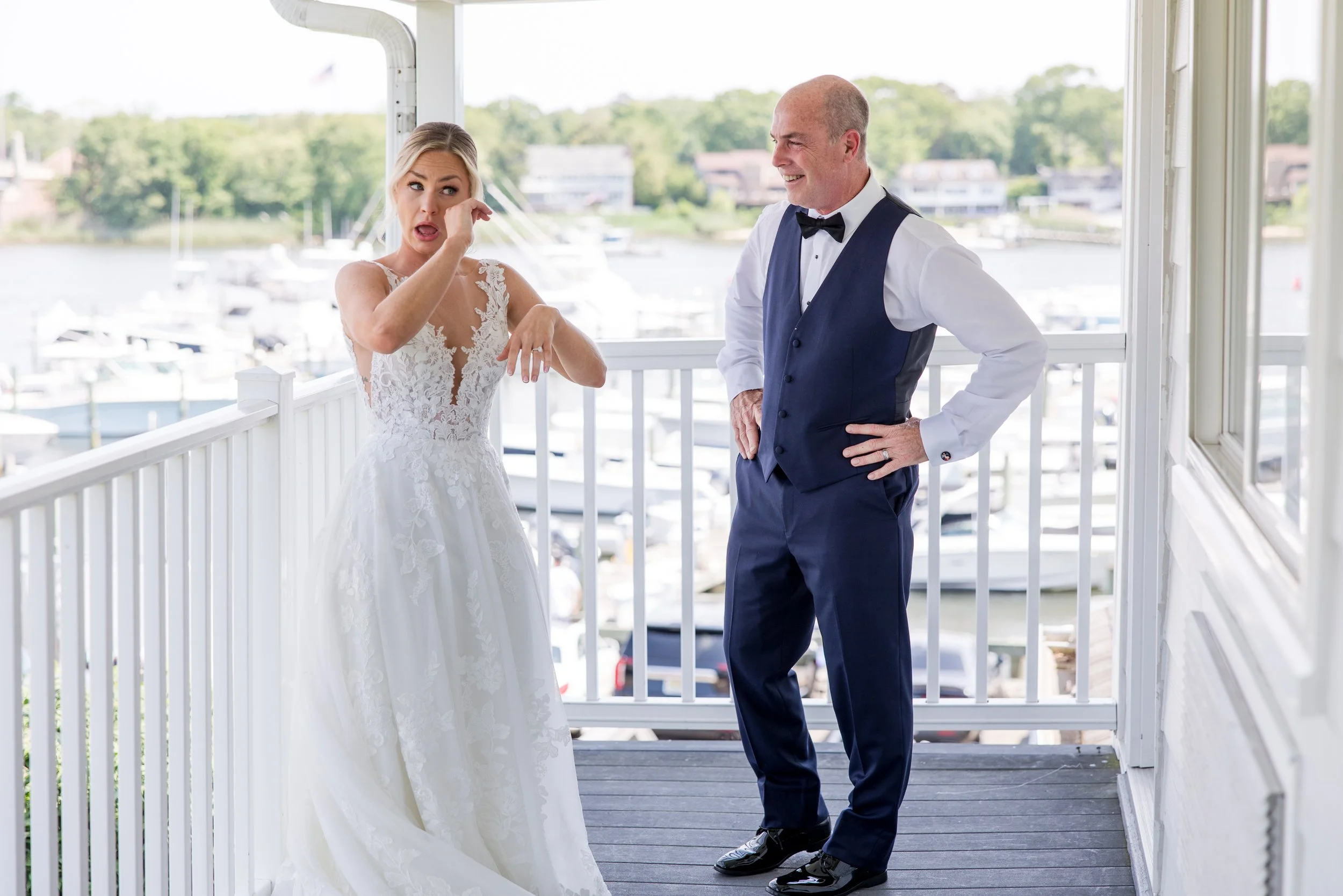 Bride crying at father's first look photo by Jessica Anne Photography at Crystal Point Yacht Club in Point Pleasant, NJ