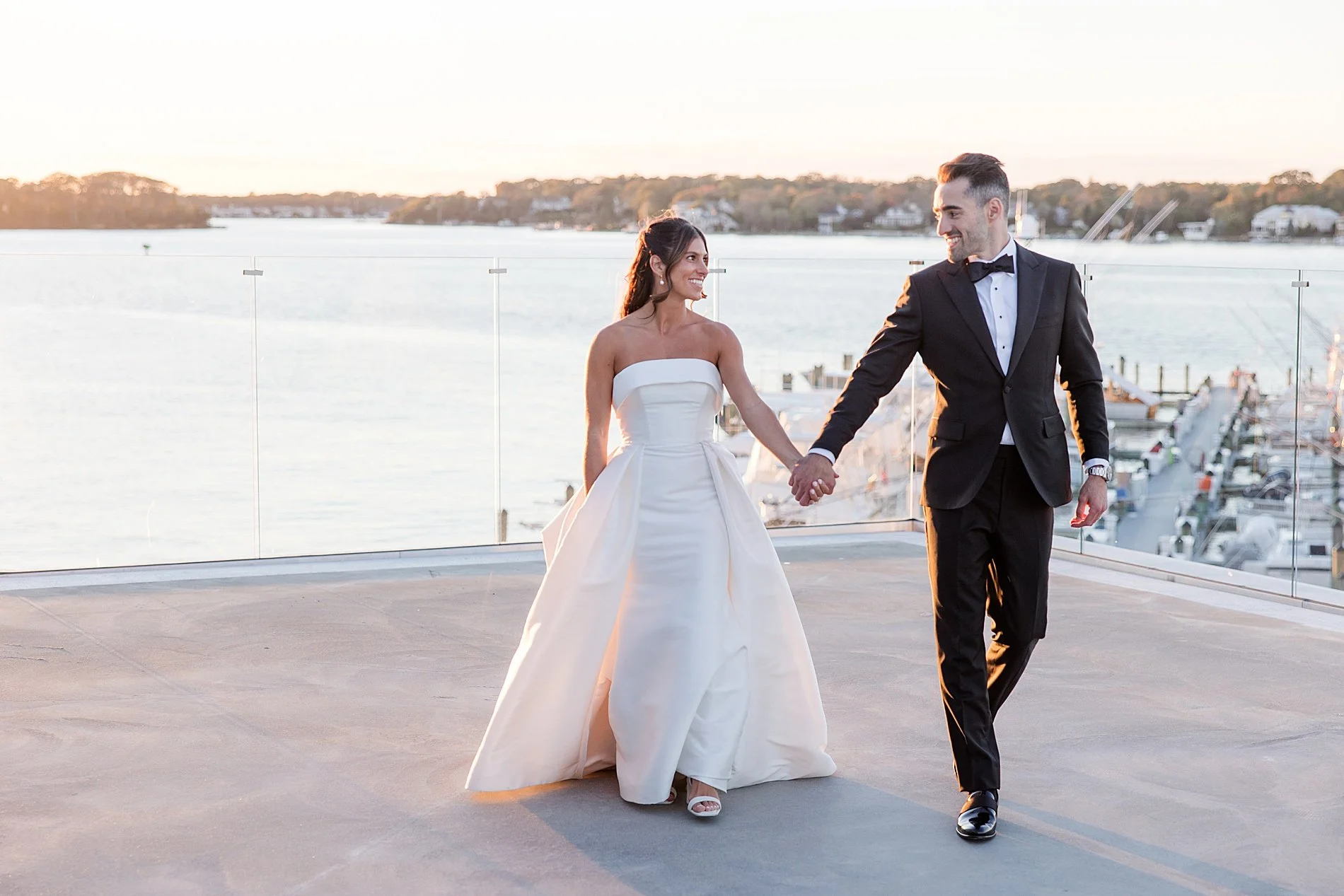  Romantic wedding portraits of newlyweds walking the beach together at Point Pleasant Beach, NJ 