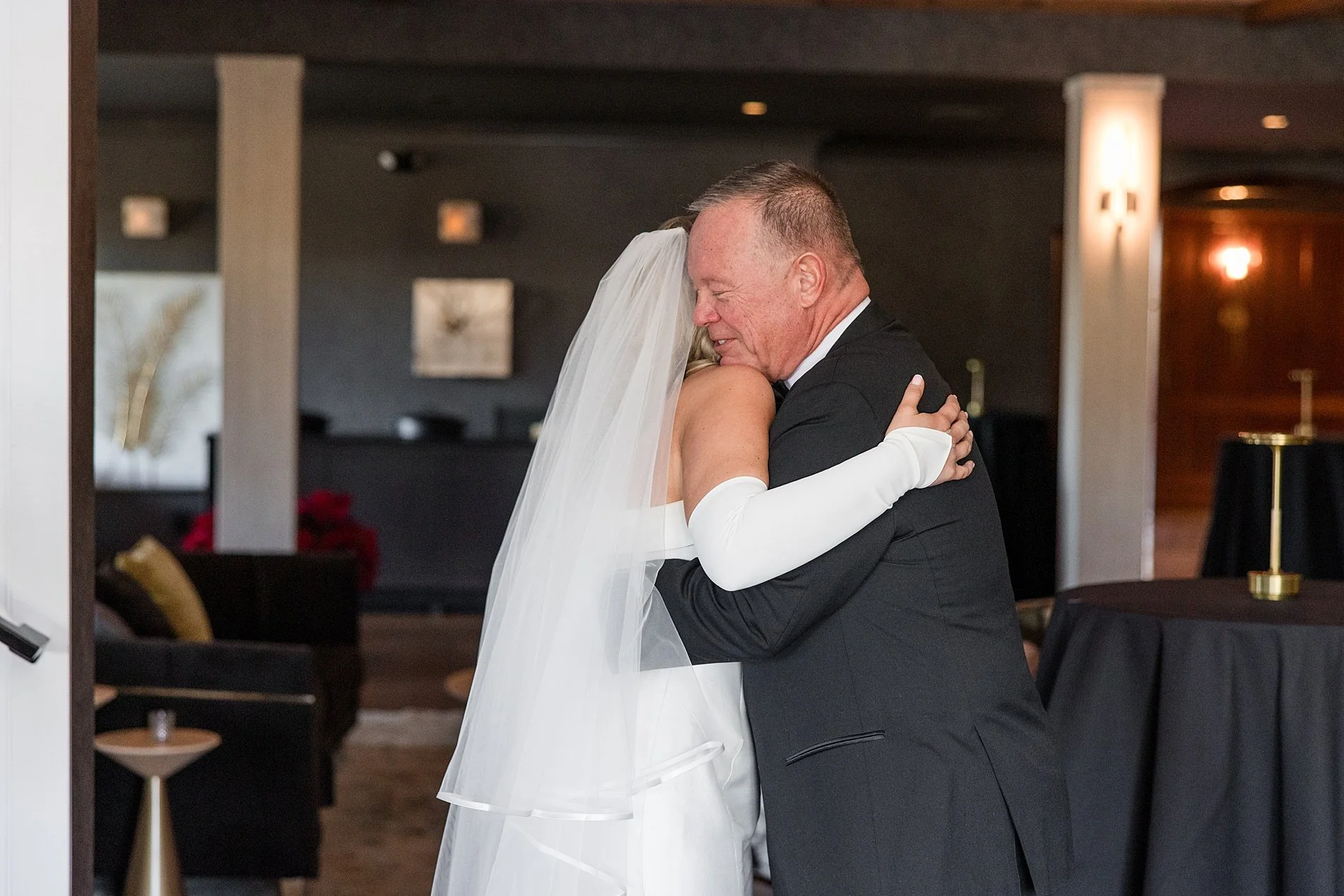  dad hugs his daughter during first look 