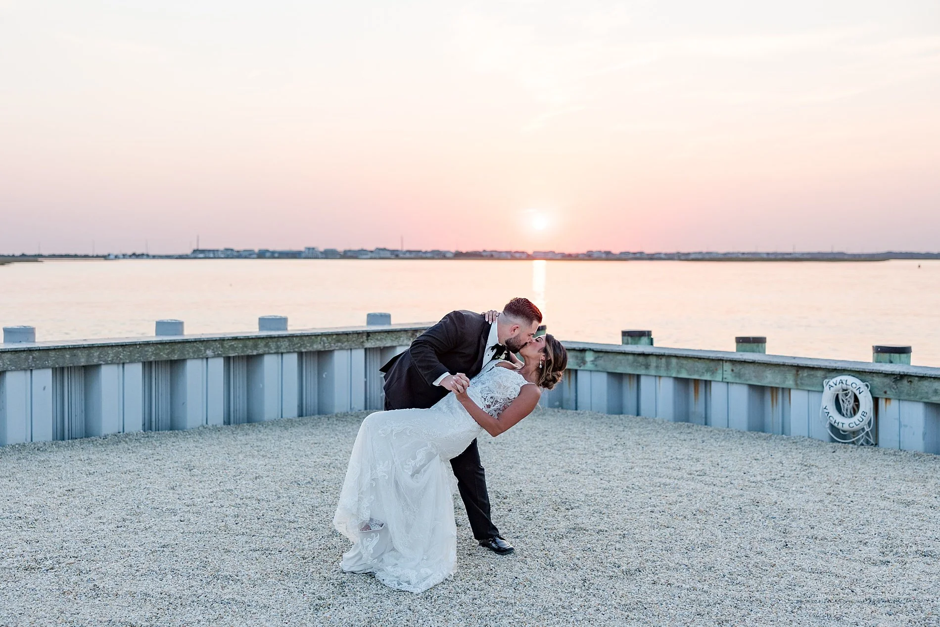 Sunset wedding photos at Waterfront Avon Yacht Club Wedding