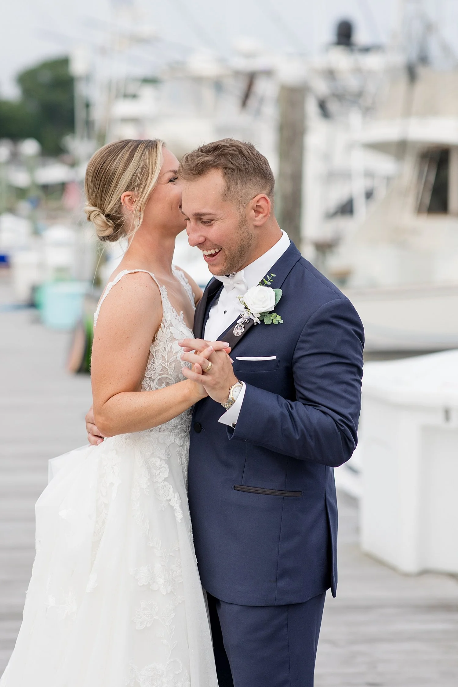  candid wedding photos by the river at Crystal Point Yacht Club   