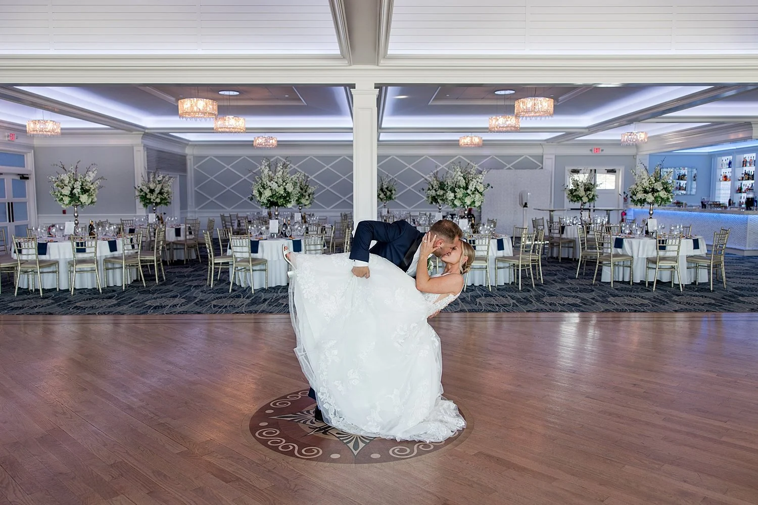  bride and groom kiss at the end of wedding night at Crystal Point Yacht Club Wedding in NJ  