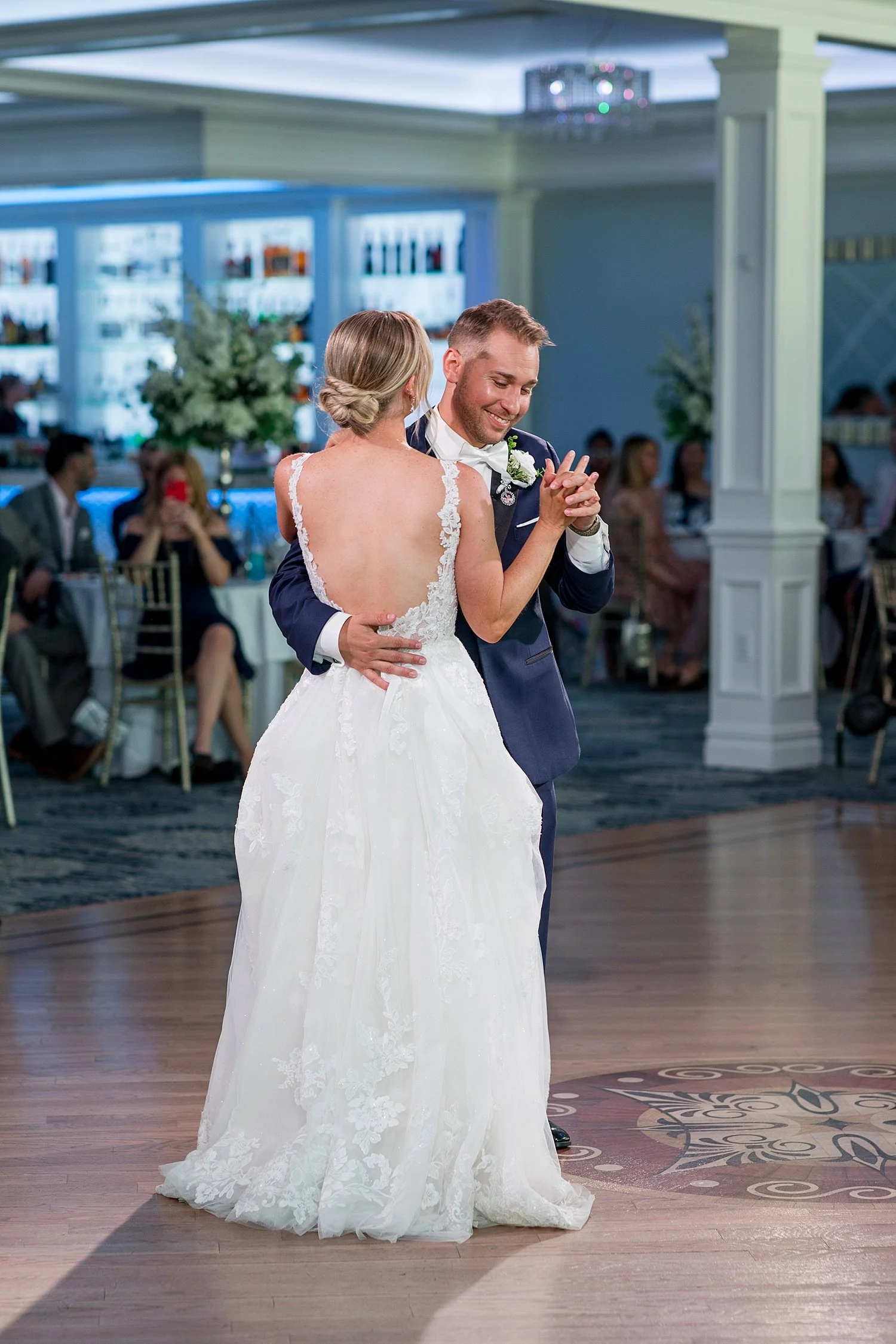  bride and groom share first dance  