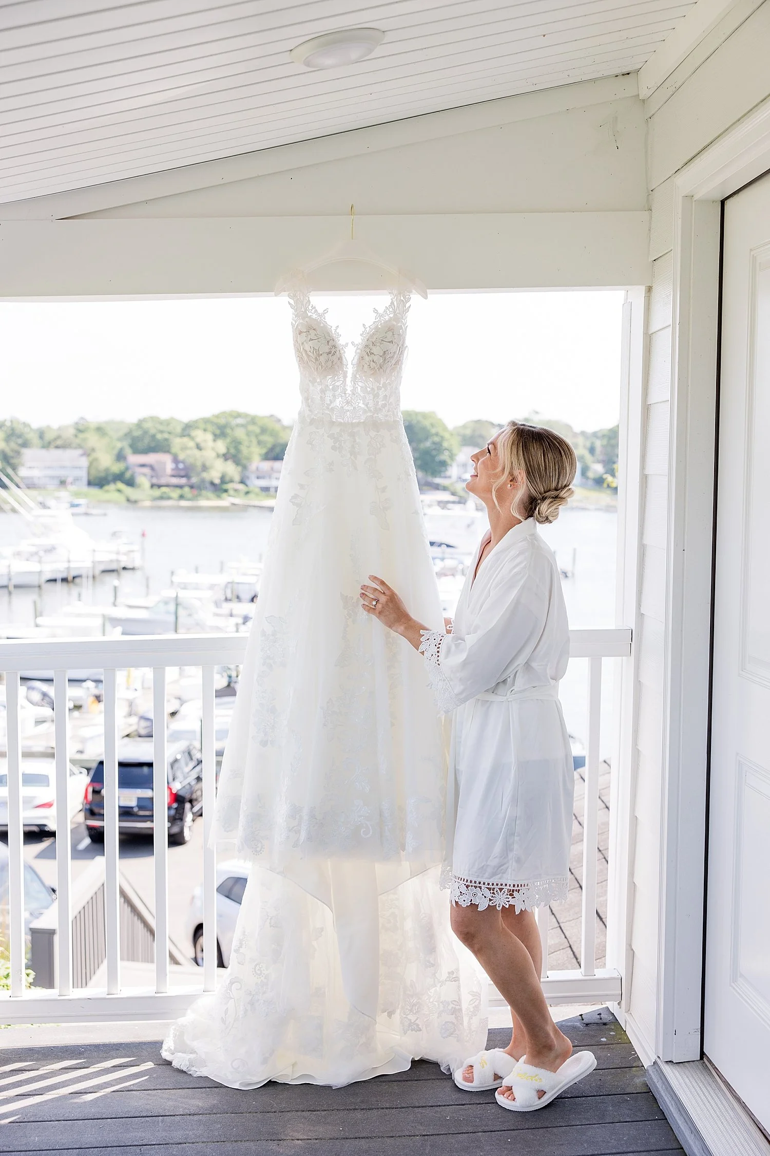  bride looking at wedding dress  