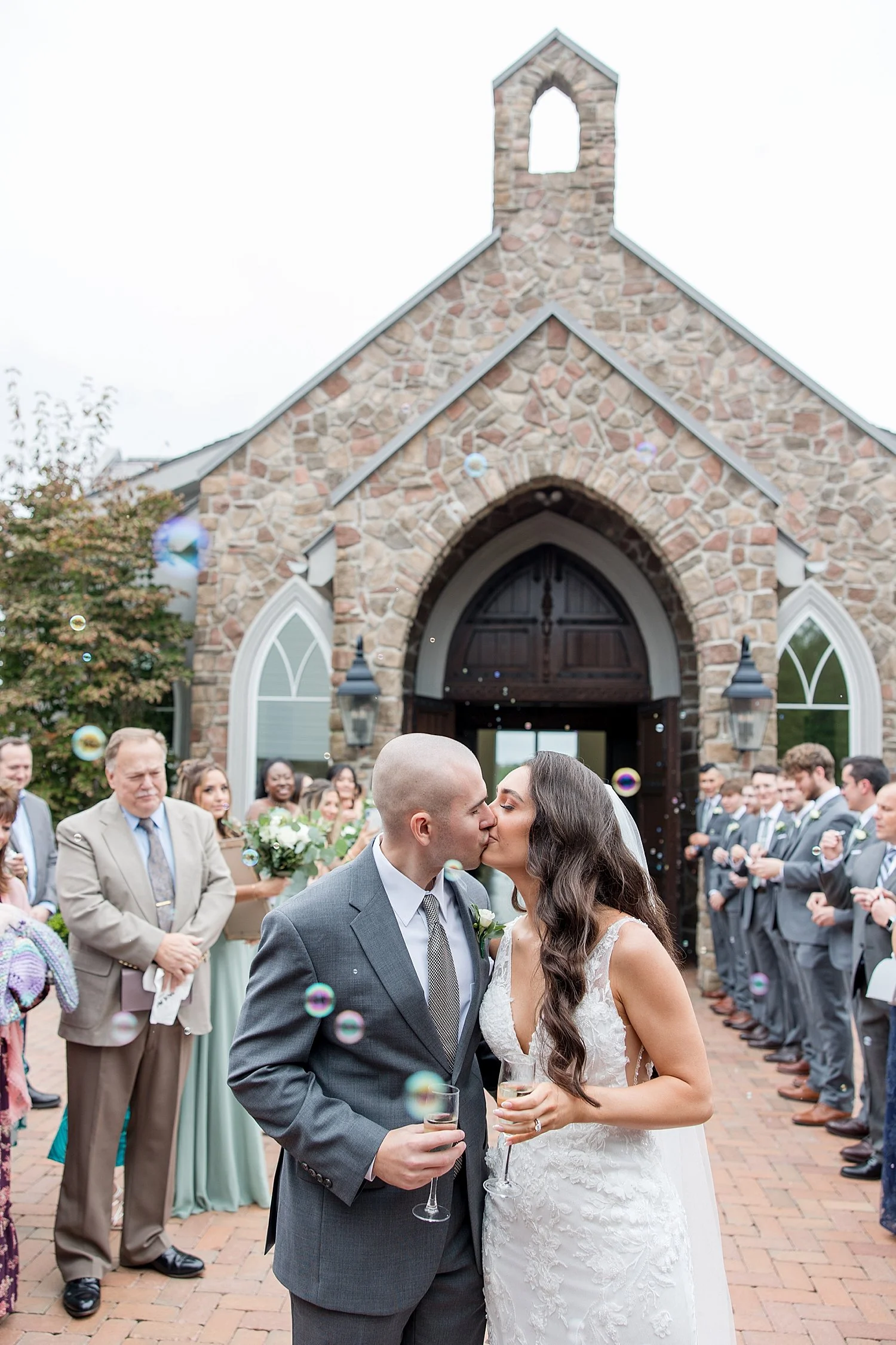  newlyweds kiss after wedding ceremony  