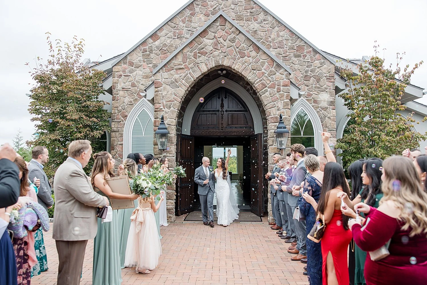  couple exit chapel of wedding ceremony 