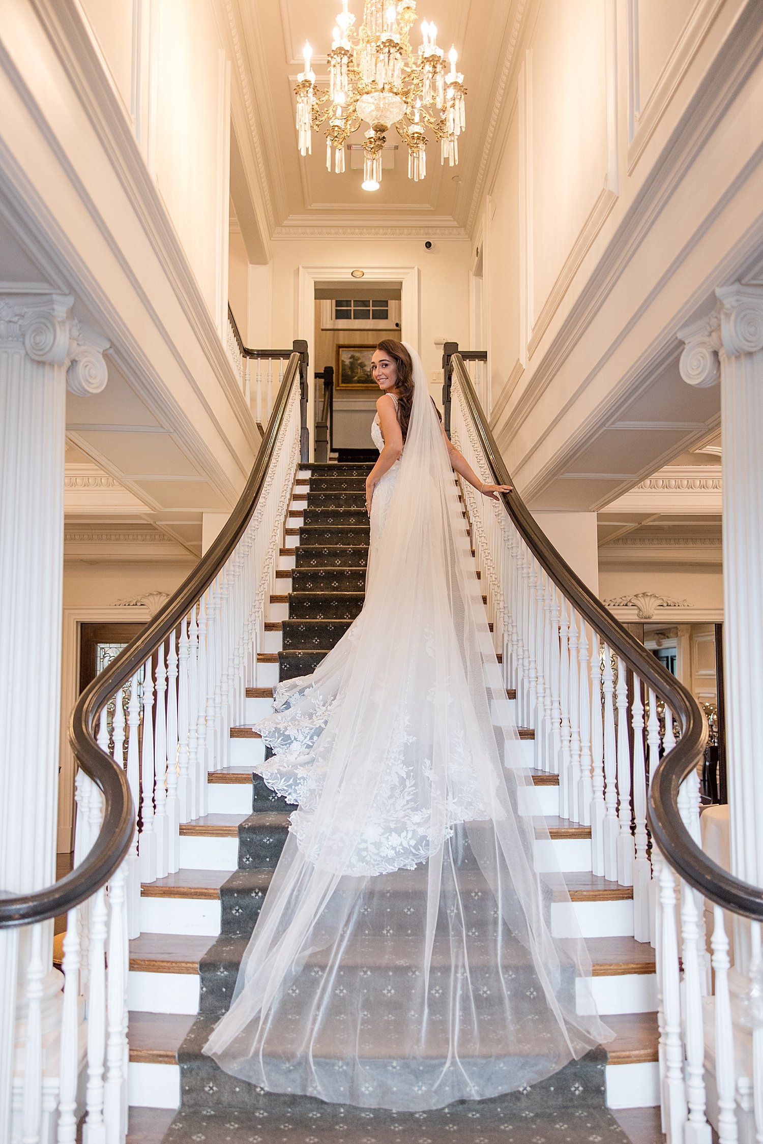  bride walking up grand staircase in Park Savoy 