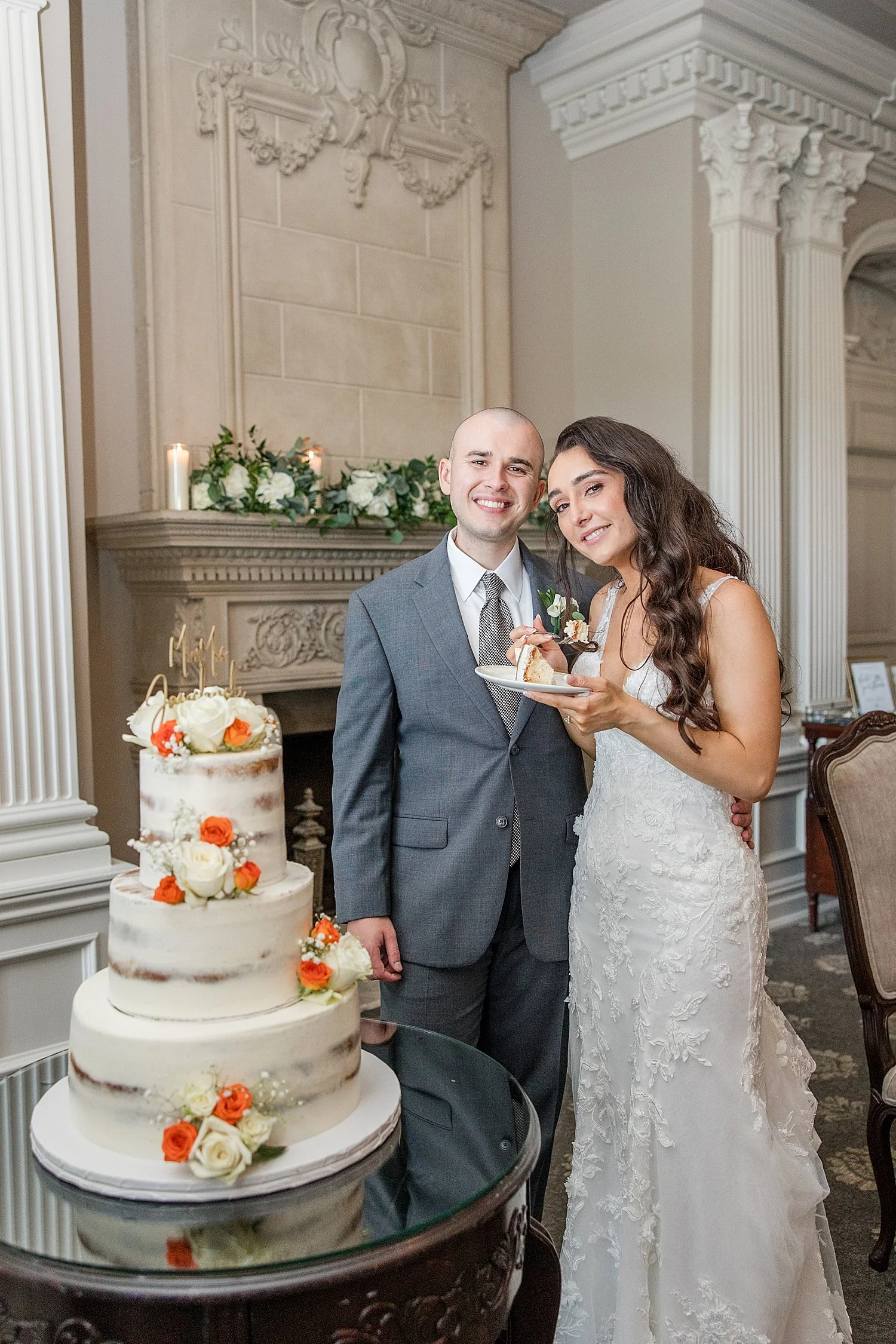  Bride and groom cut their wedding cake  