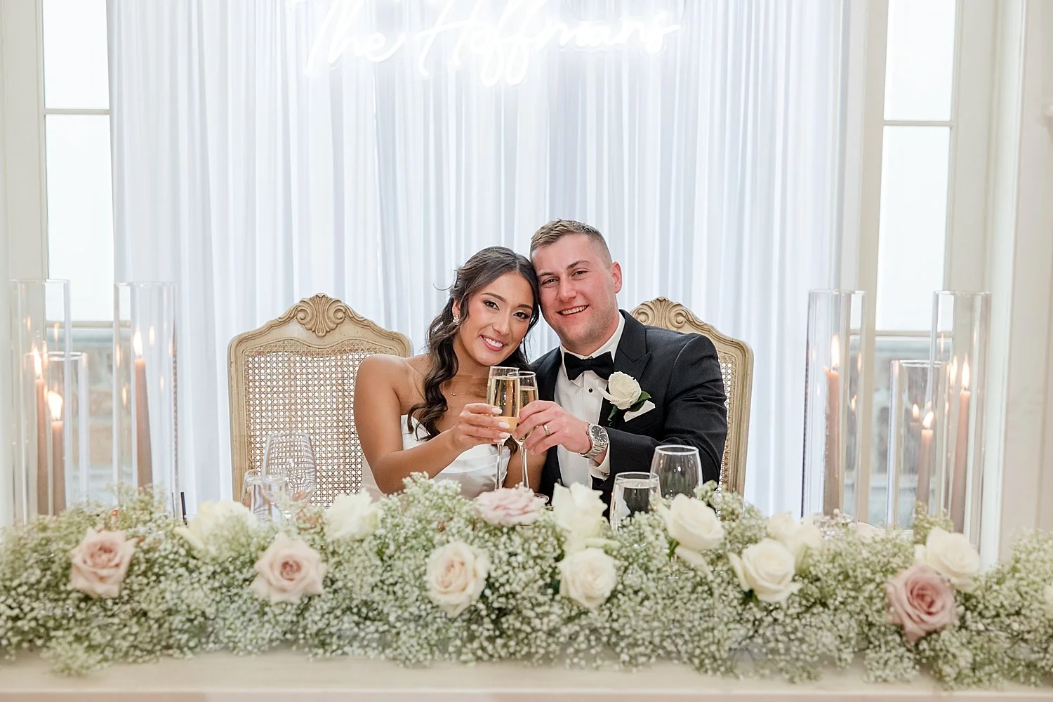  bride and groom at head table  