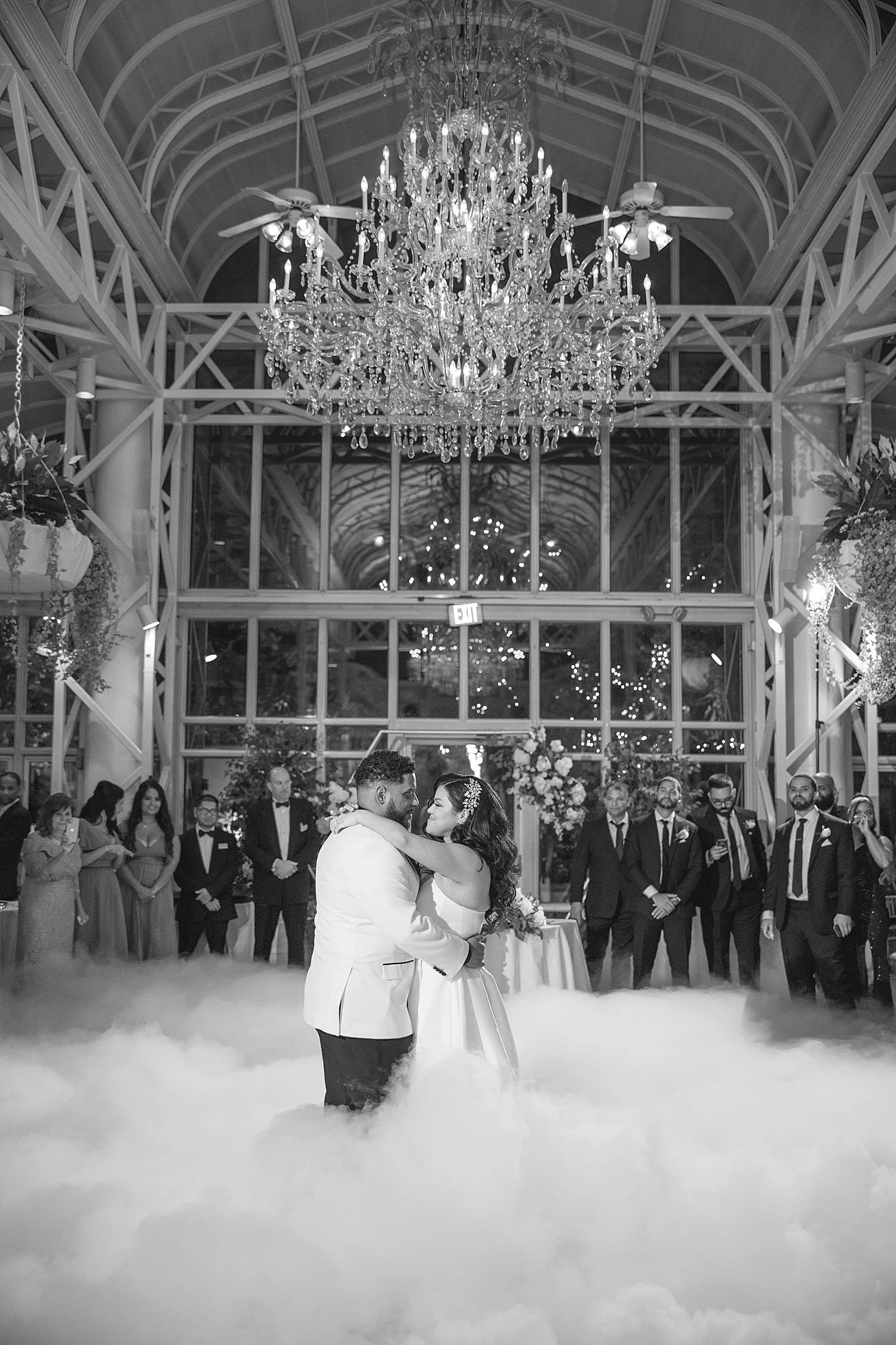  bride and groom on dance floor with fog machine  