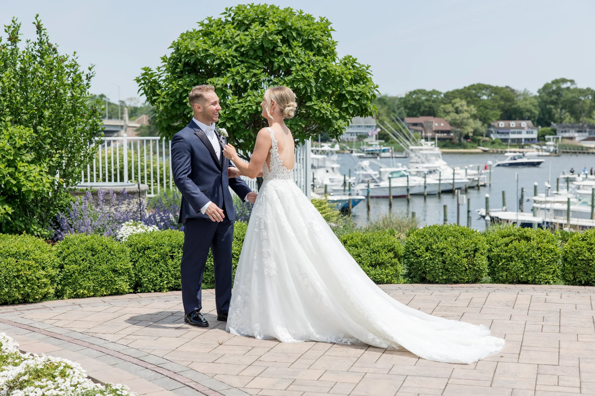 First look photo on the water at Crystal Point Yacht Club in Point Pleasant, NJ by Jessica Anne Photography