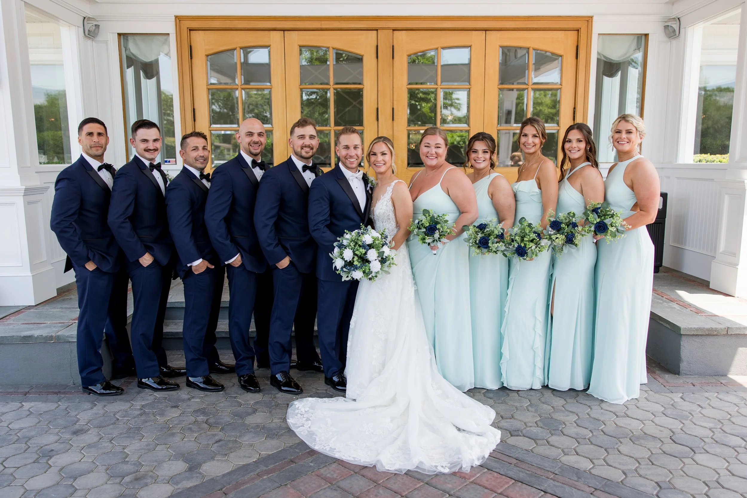 Wedding party photo at Crystal Point Yacht Club in Point Pleasant, NJ. Photo by Jessica Anne Photography