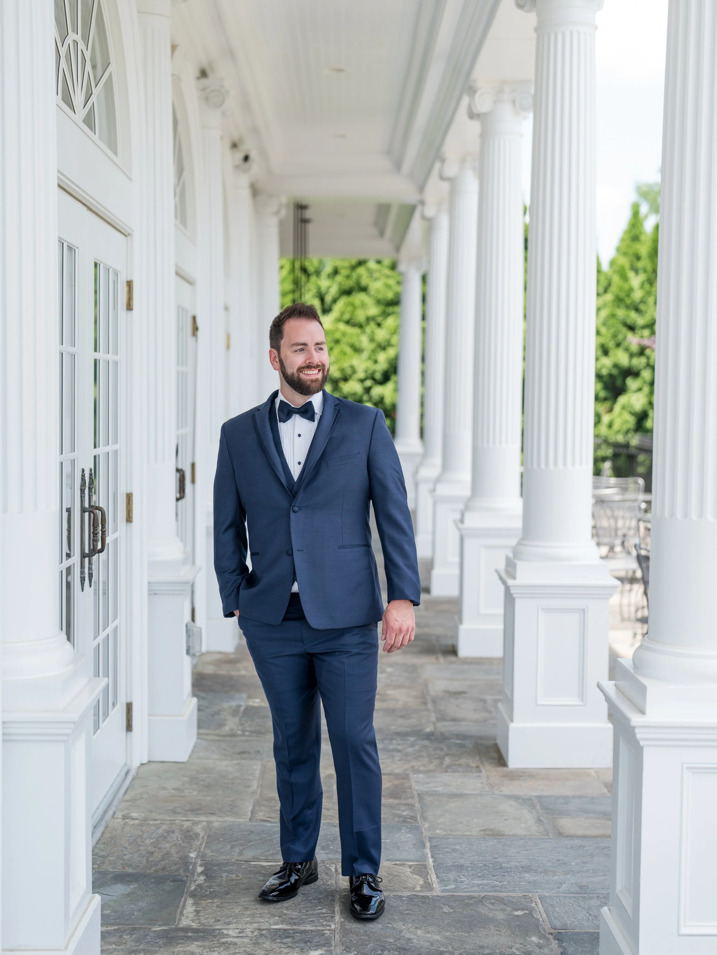 Groom solo photo outside at The Park Savoy Estate in Florham Park, NJ by wedding photographer, Jessica Anne Photography