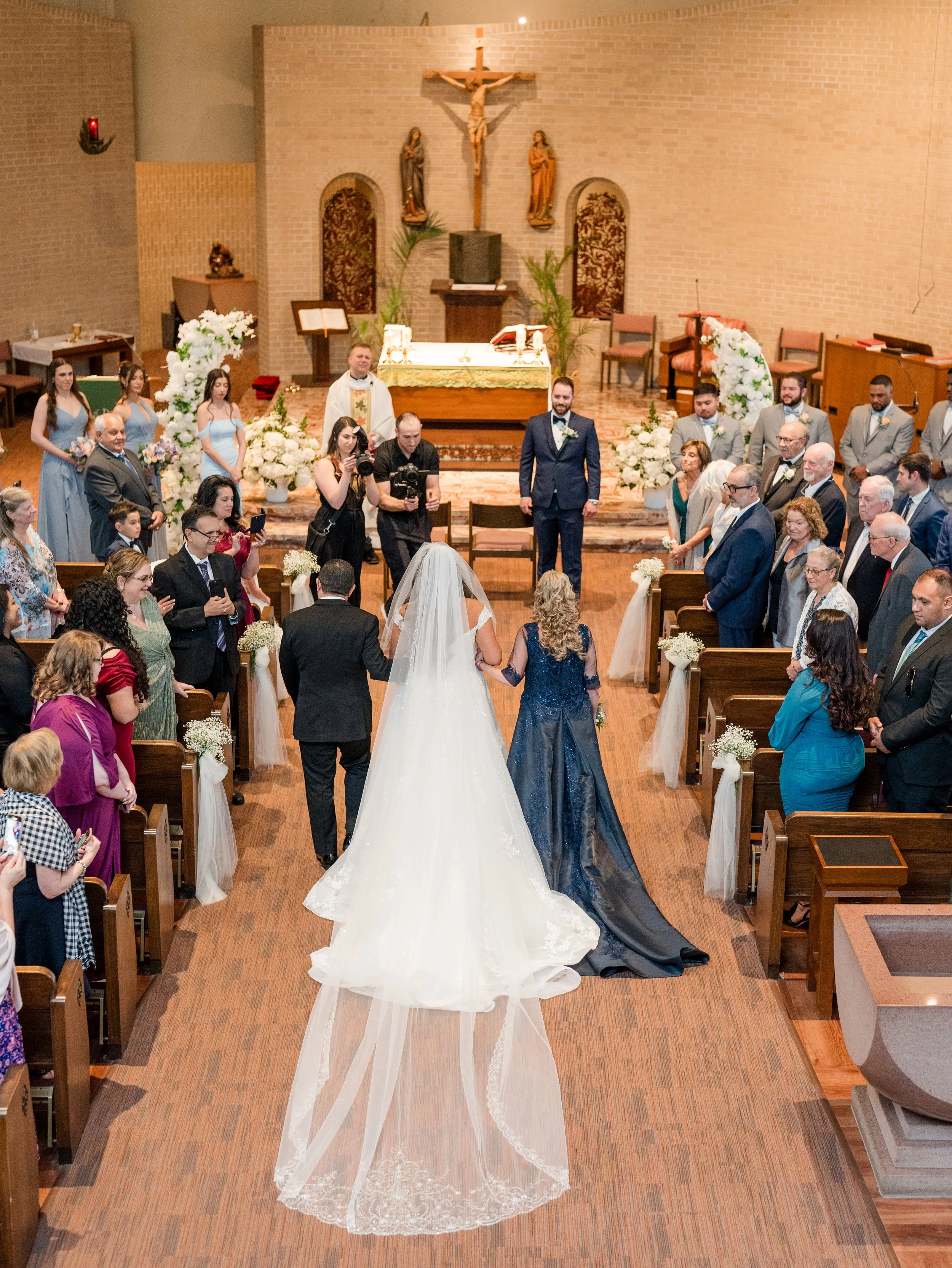 Mother and father walking bride down the aisle in church wedding ceremony by NJ photographer, Jessica Anne Photography