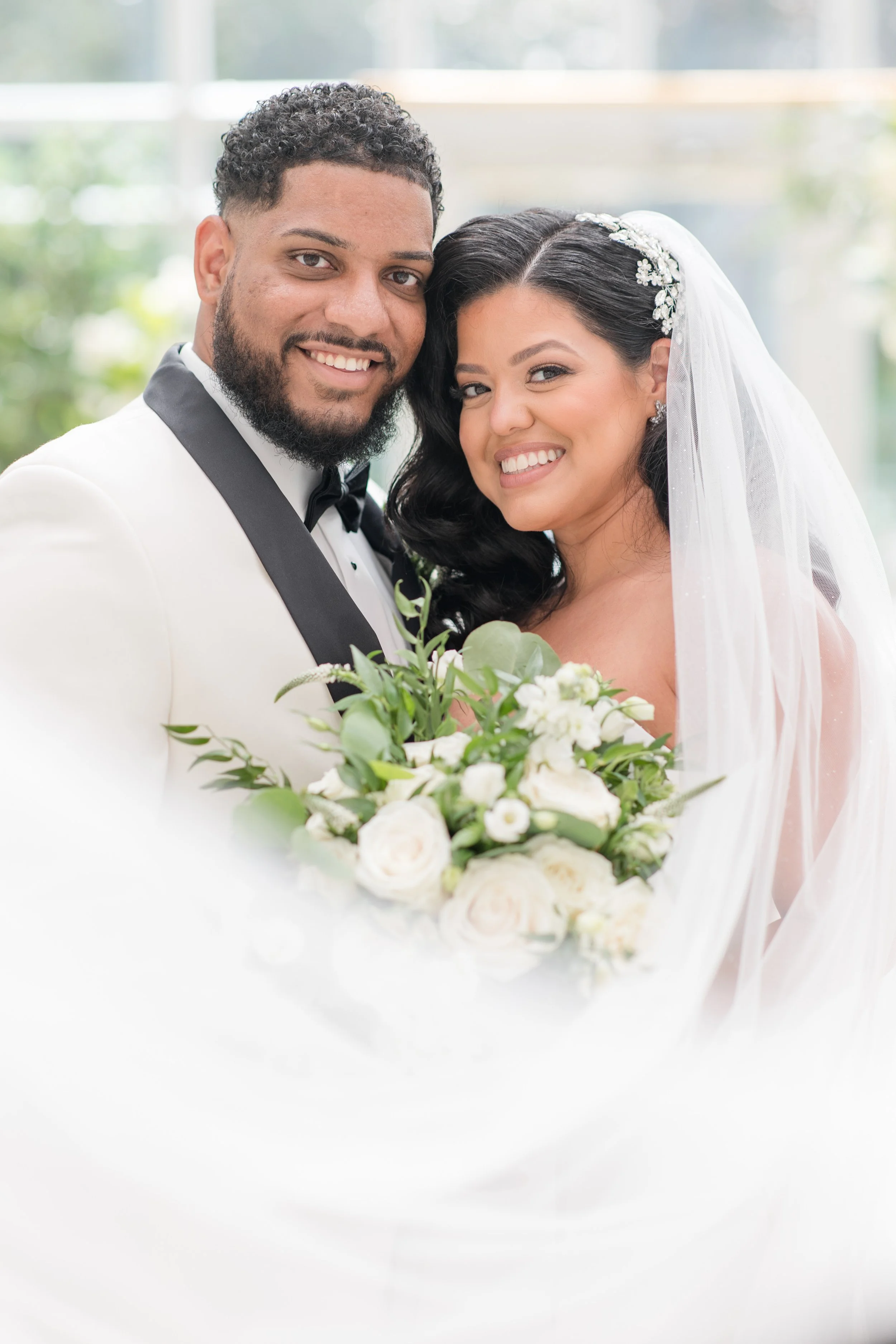 Veil framing bride and groom wedding photo by Jessica Anne Photography