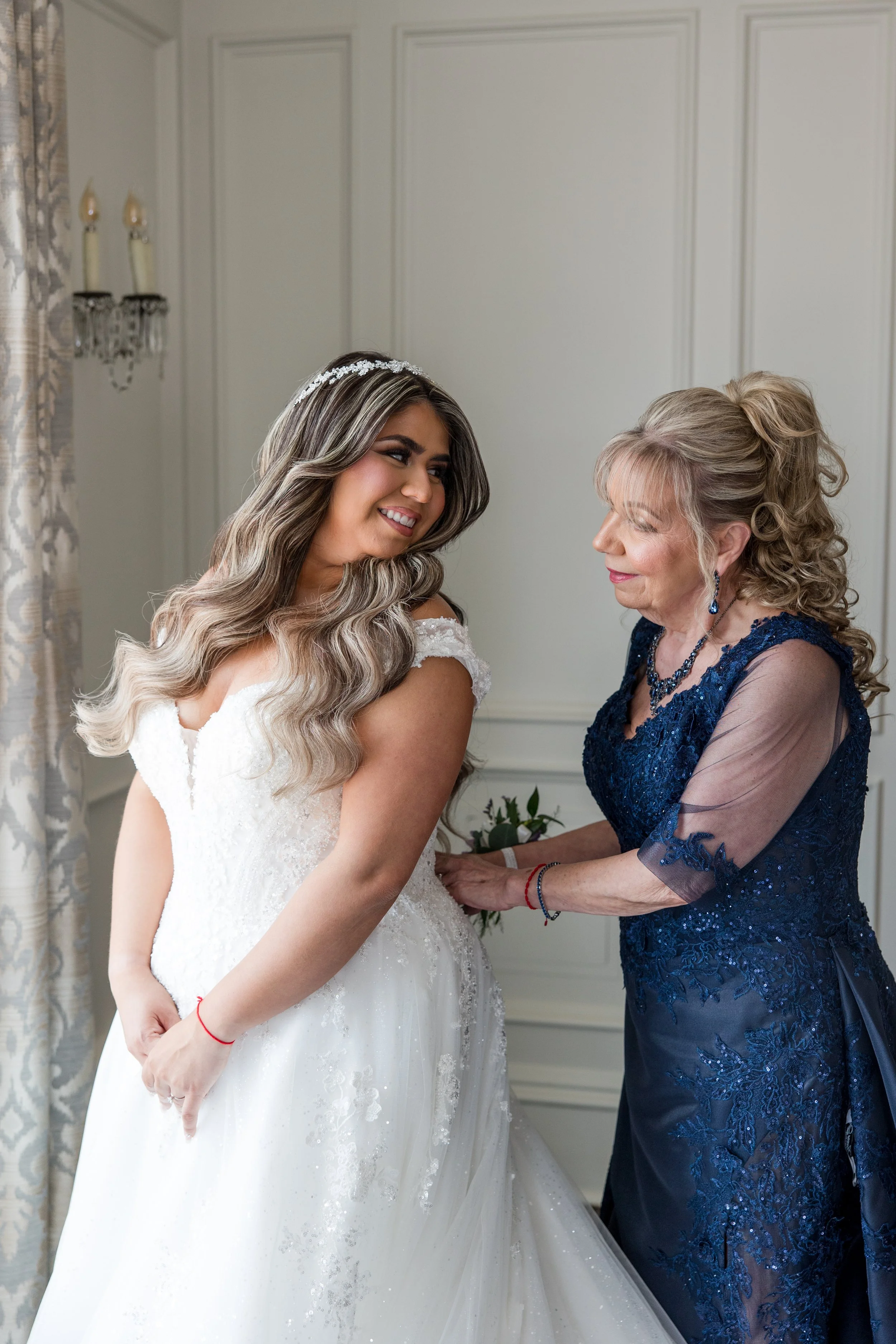Mother of the bride buttoning dress photo by New Jersey wedding photographer, Jessica Anne Photography