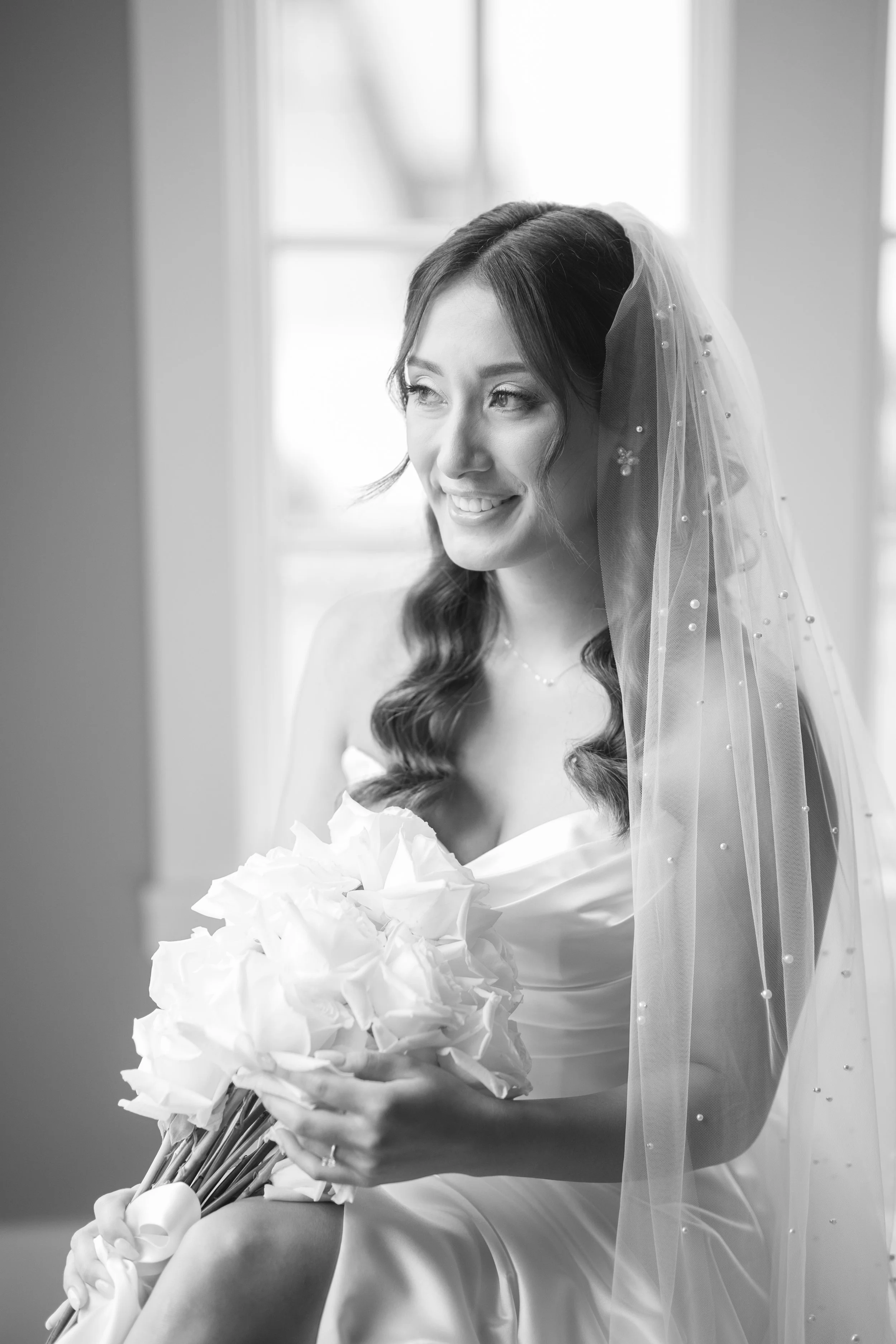 Bride holding bouquet photo. Captured by Jessica Anne Photography at the Ryland Inn in White House Station, NJ