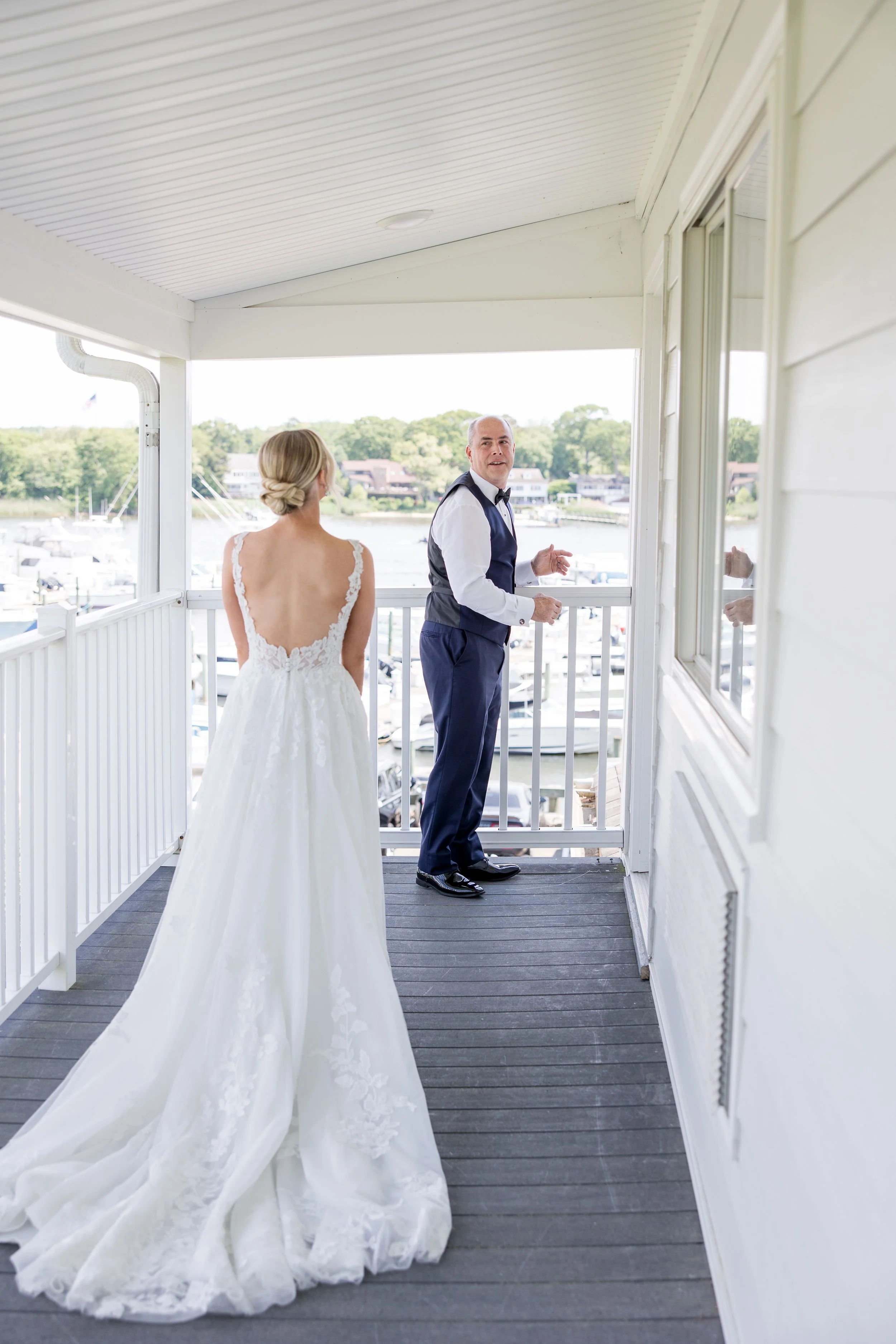 Father of the bride's first look photo by Jessica Anne Photography at Crystal Point Yacht Club in Point Pleasant, NJ