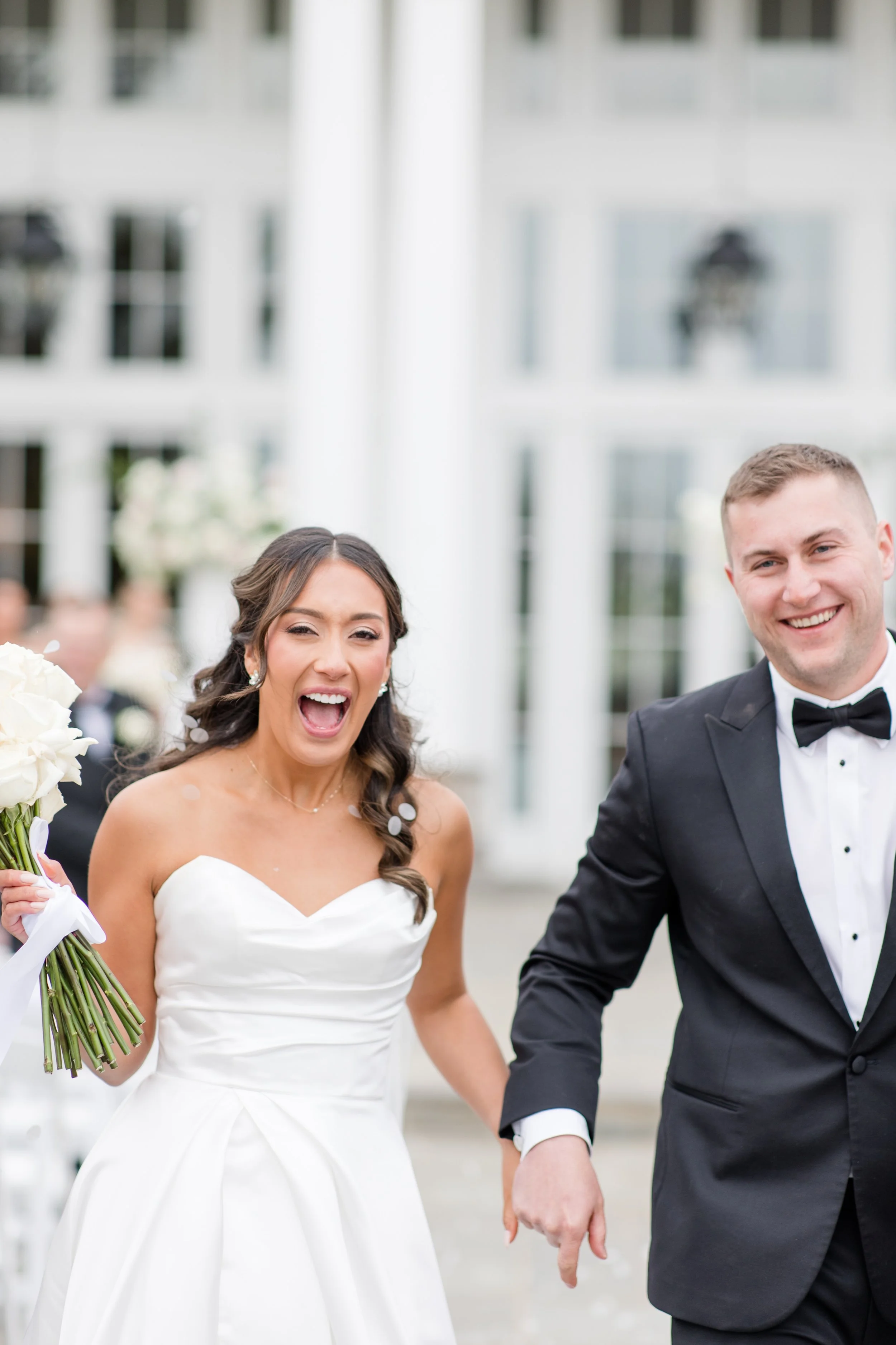 Cheering bride and groom walking down the aisle just married wedding photo by Jessica Anne Photography at the Ryland Inn in White House Station, NJ
