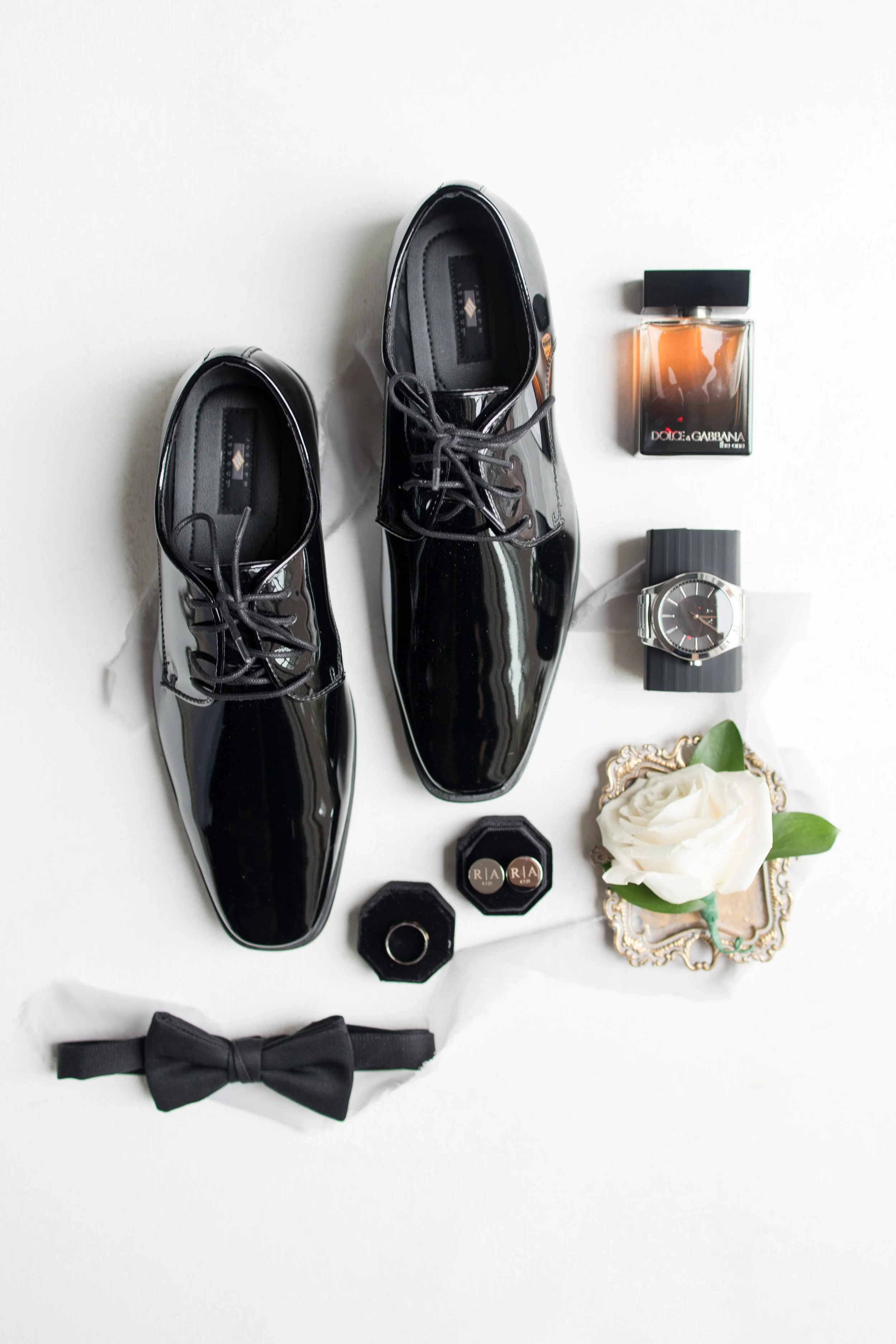 Groom accessory details photo - Shoes, rings, cuff links, bow tie, cologne, boutonniere and watch - by Jessica Anne, NJ Wedding Photographer. 