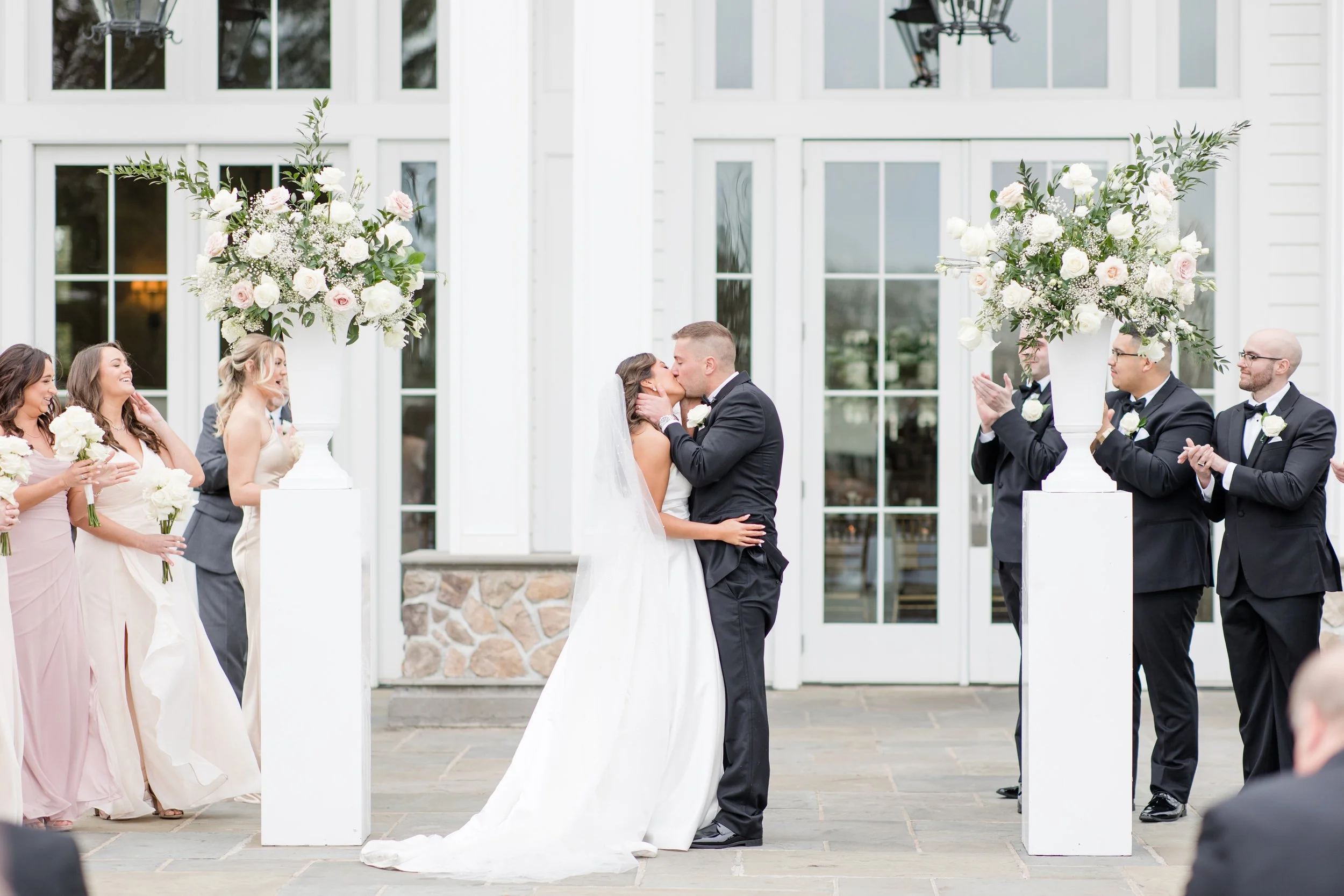 Outdoor ceremony first kiss wedding photo by Jessica Anne Photography at the Ryland Inn in White House Station, NJ
