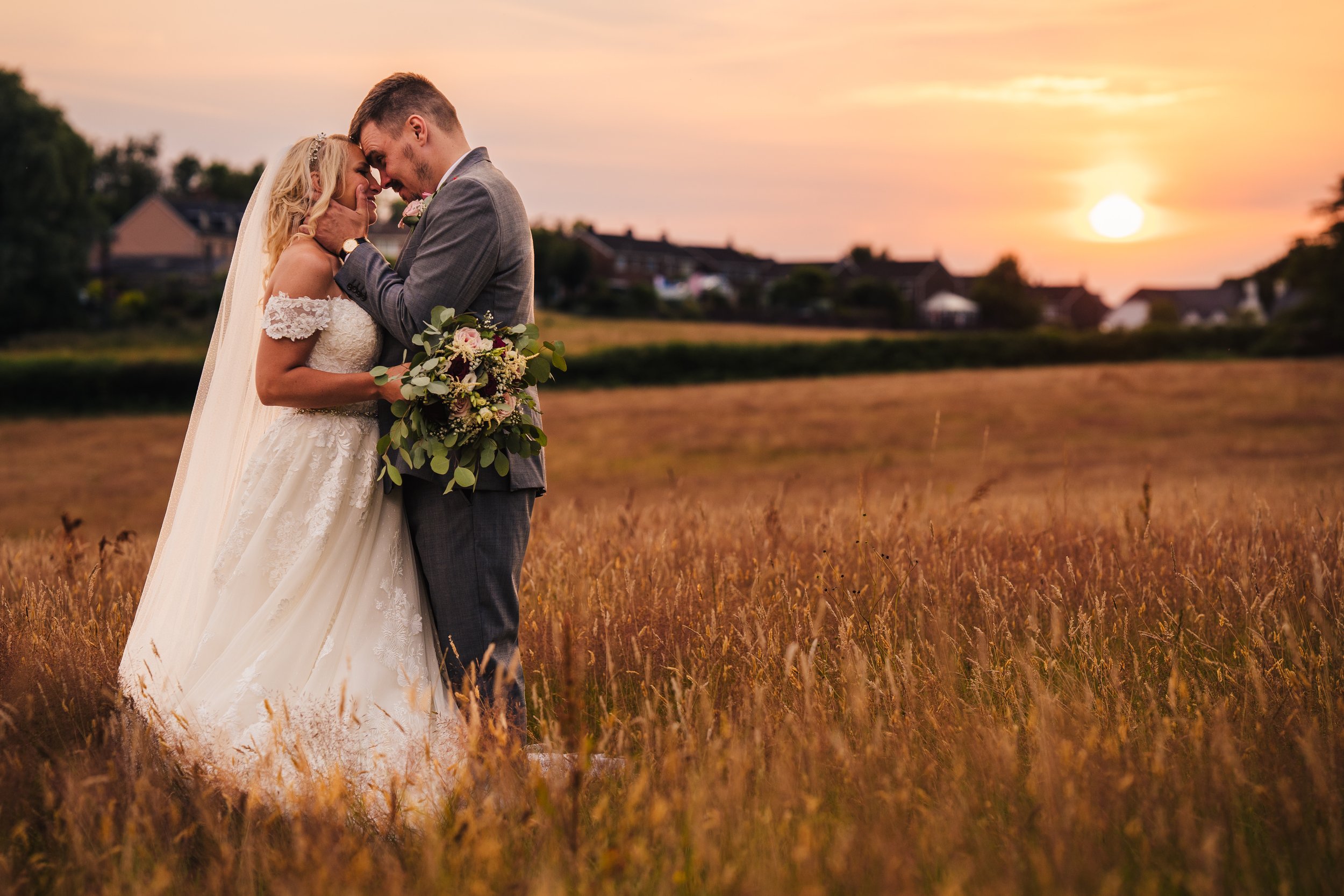 bride-and-groom-meadow-sunset.jpg