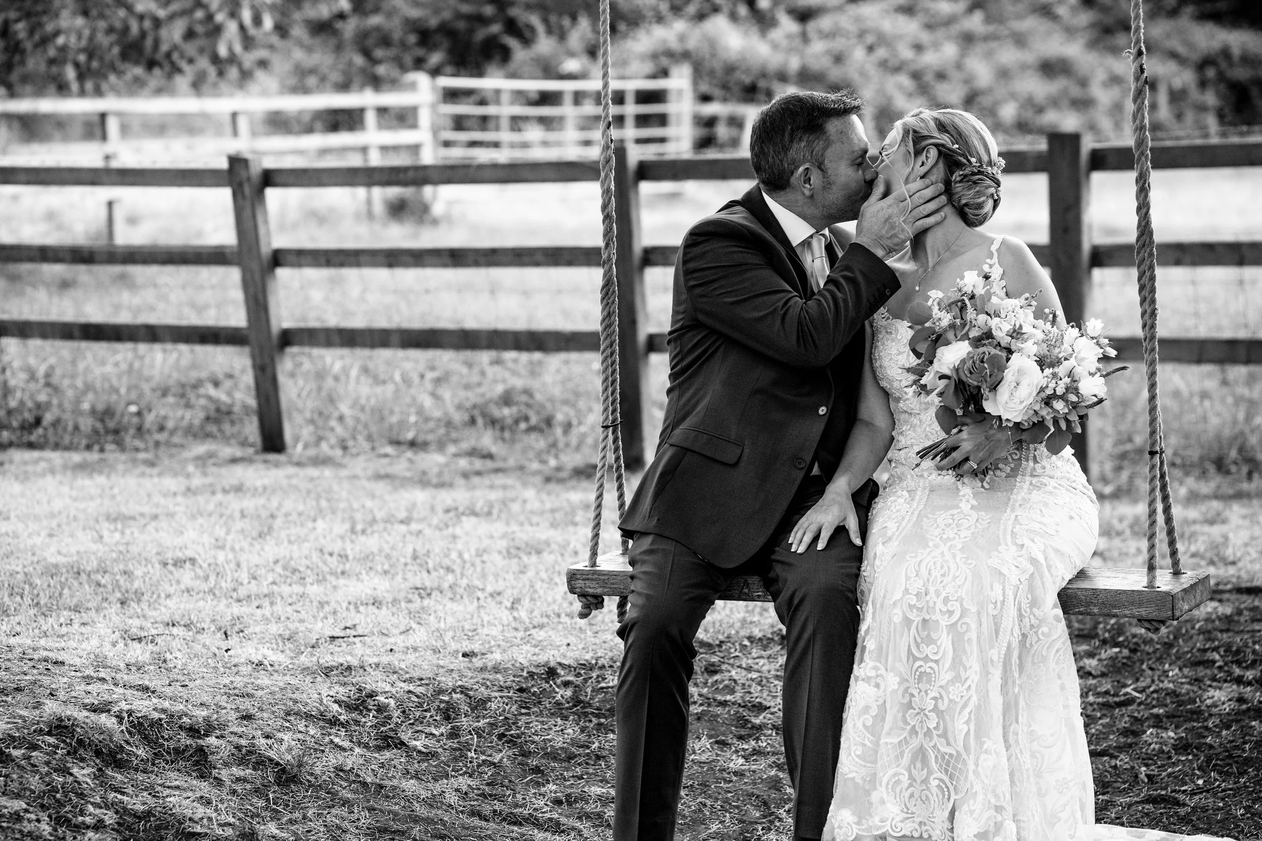 Bride-groom-couples-shoot-swing-kiss.jpg