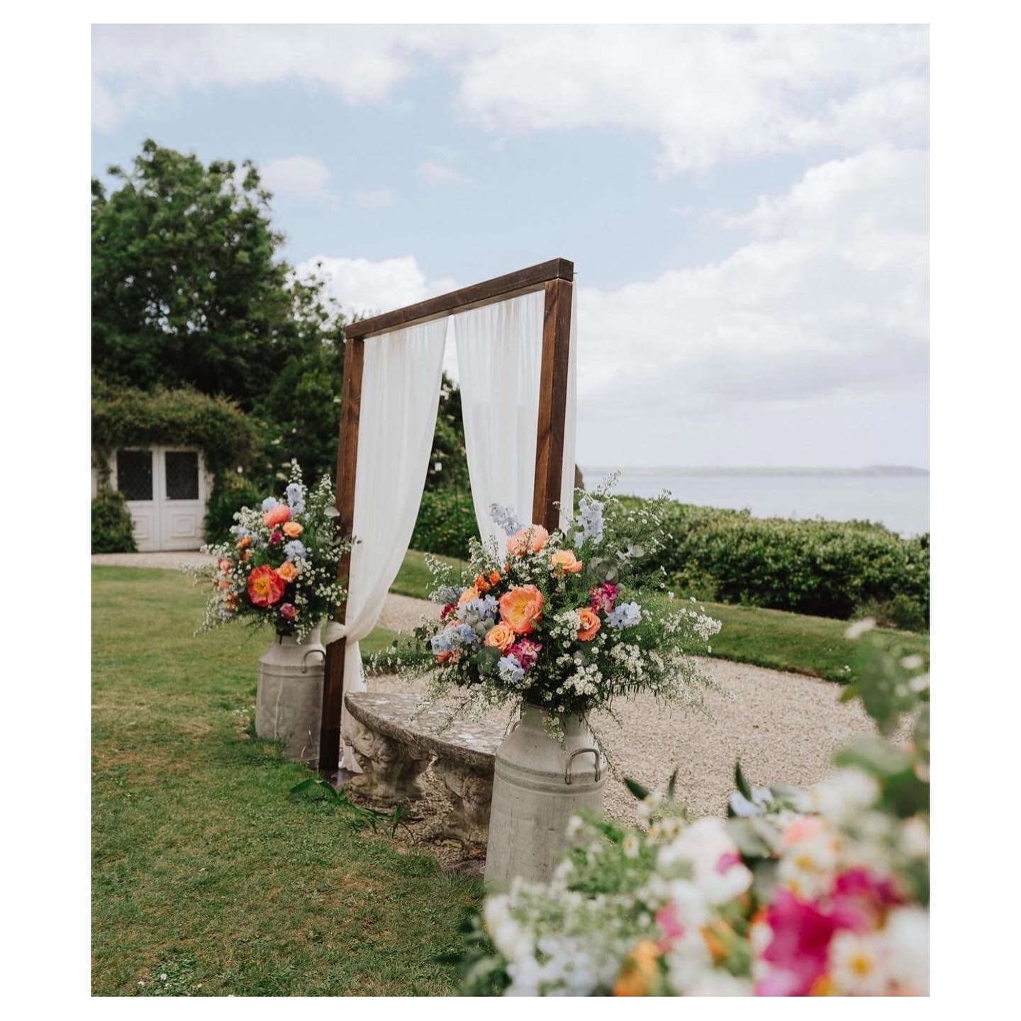 Our wooden Arch is creating a beautiful backdrop at @thebigbeautifulbeachhouse with stunning flowers by @annasflowerbarn and photography by @thekensingtonphotographer