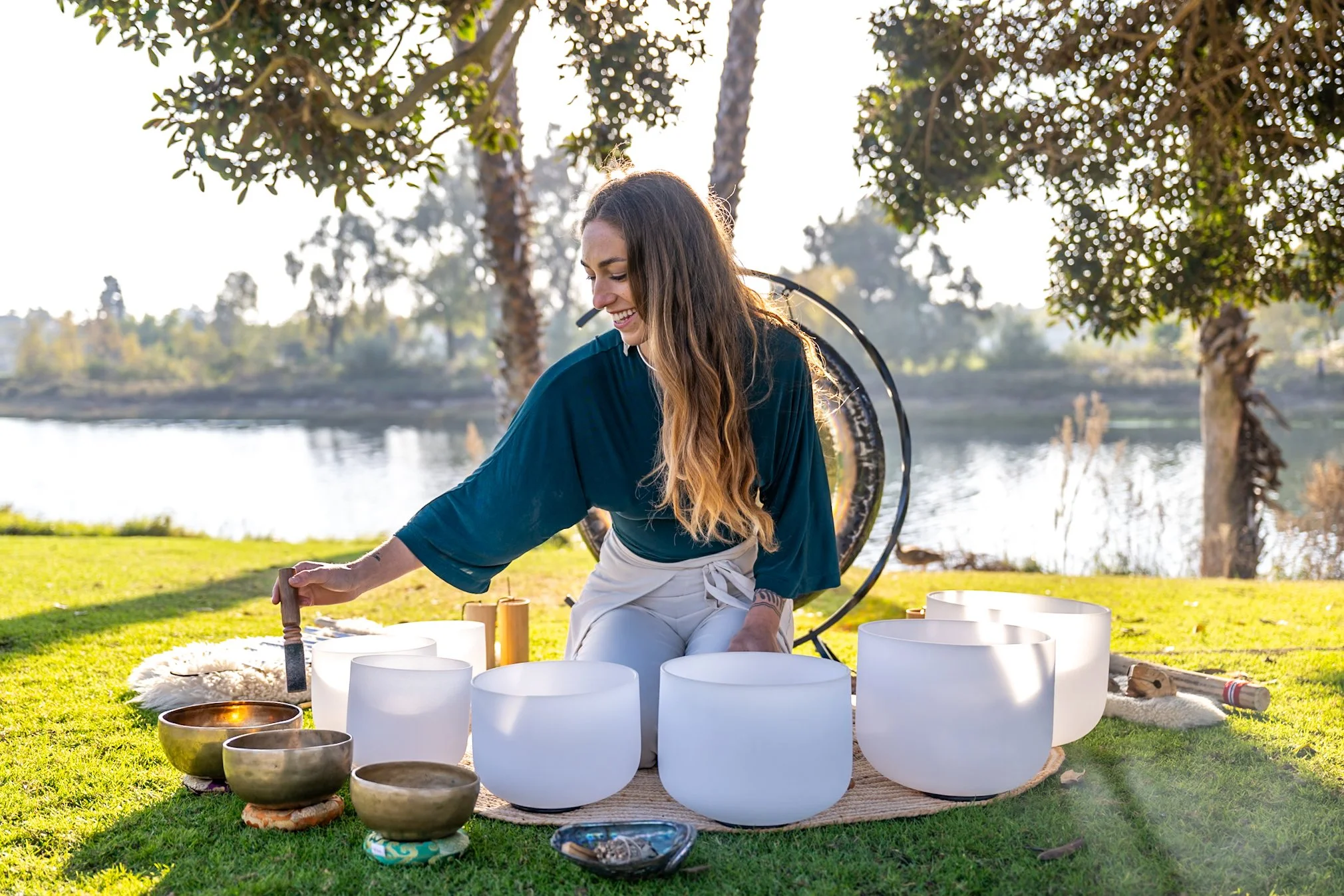 Gong and crystal bowls setup in a park