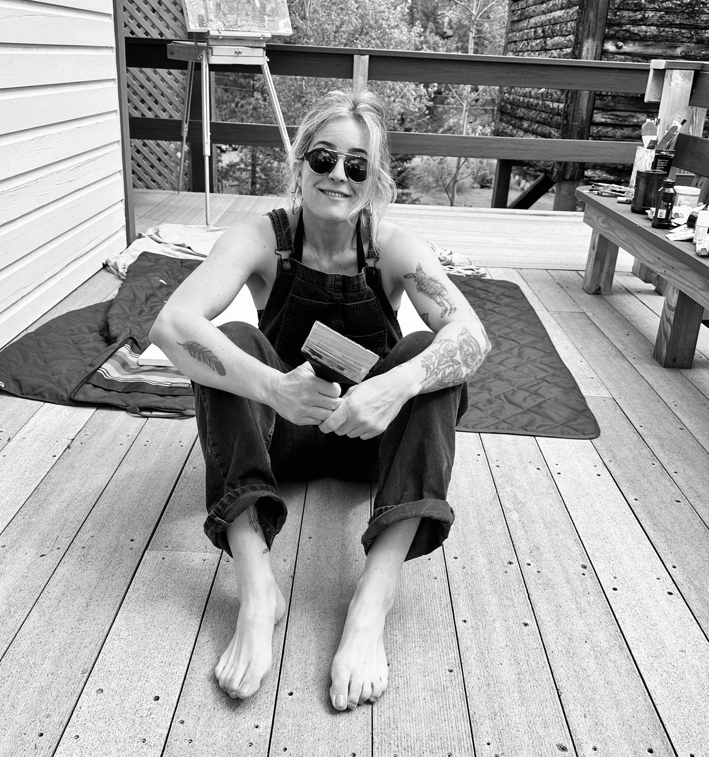 If you’ve been coming to Stillpoint this month, you might have noticed the beautiful paintings by Jasmine McGlade. What you might not know is that she is also an award-winning filmmaker, world-class fencer, and mother.
Obviously, she has a lot