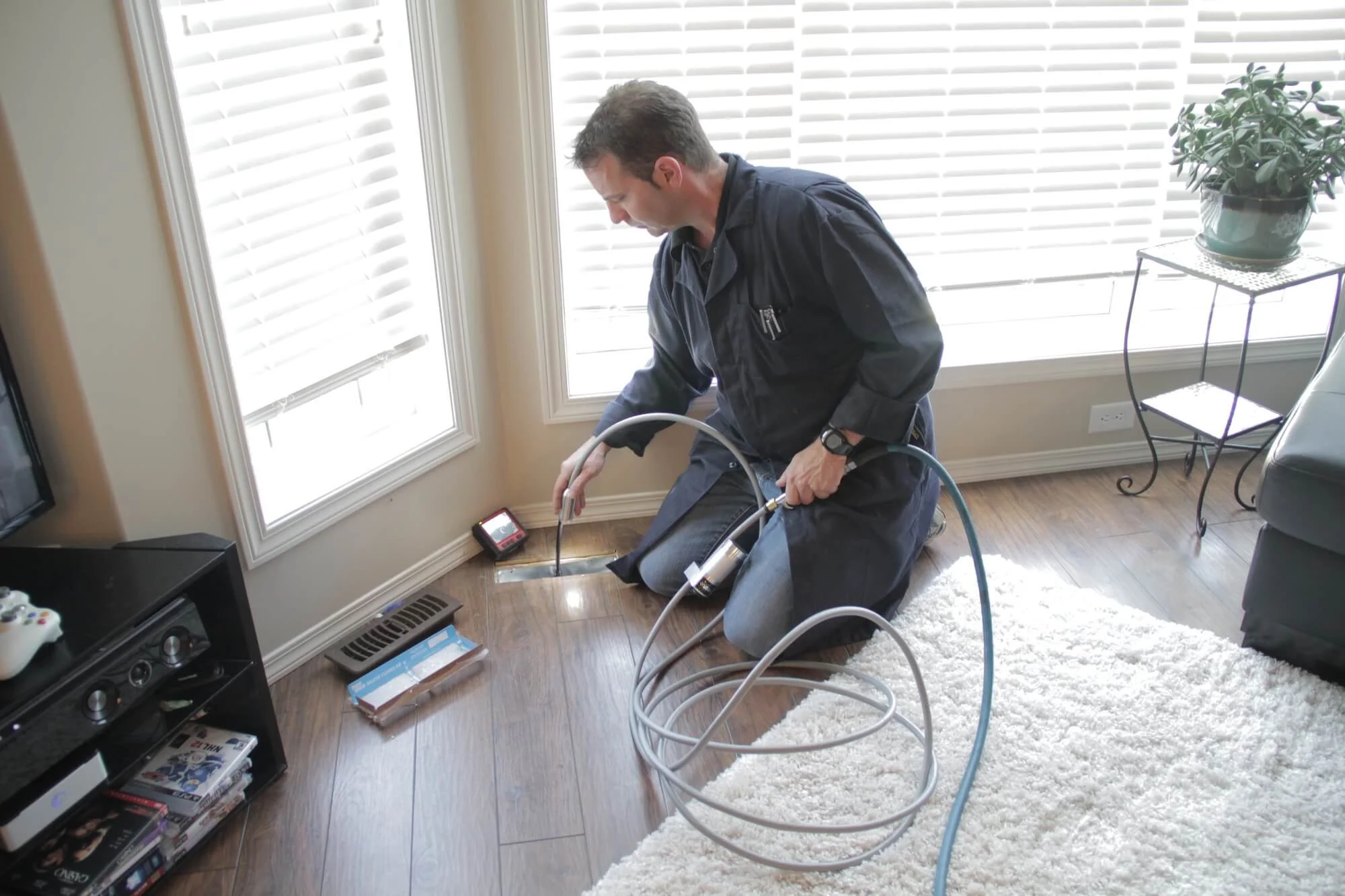 a certified HVAC professional at work