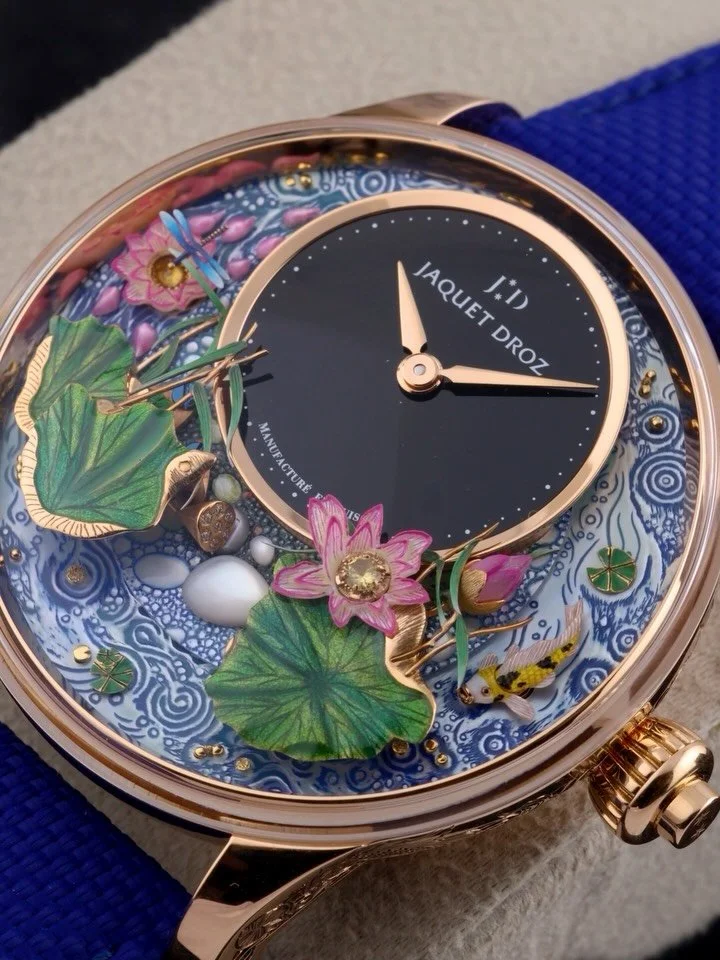 🪷 Zen in motion. The Jaquet Droz Magic Lotus Automaton &mdash; where every tick is meditation, every detail is art.

A miniature zen garden: onyx time dial, lotus leaves, rotating disk with koi + lotus &mdash; a tribute to life&rsquo;s cycle. 

Hand