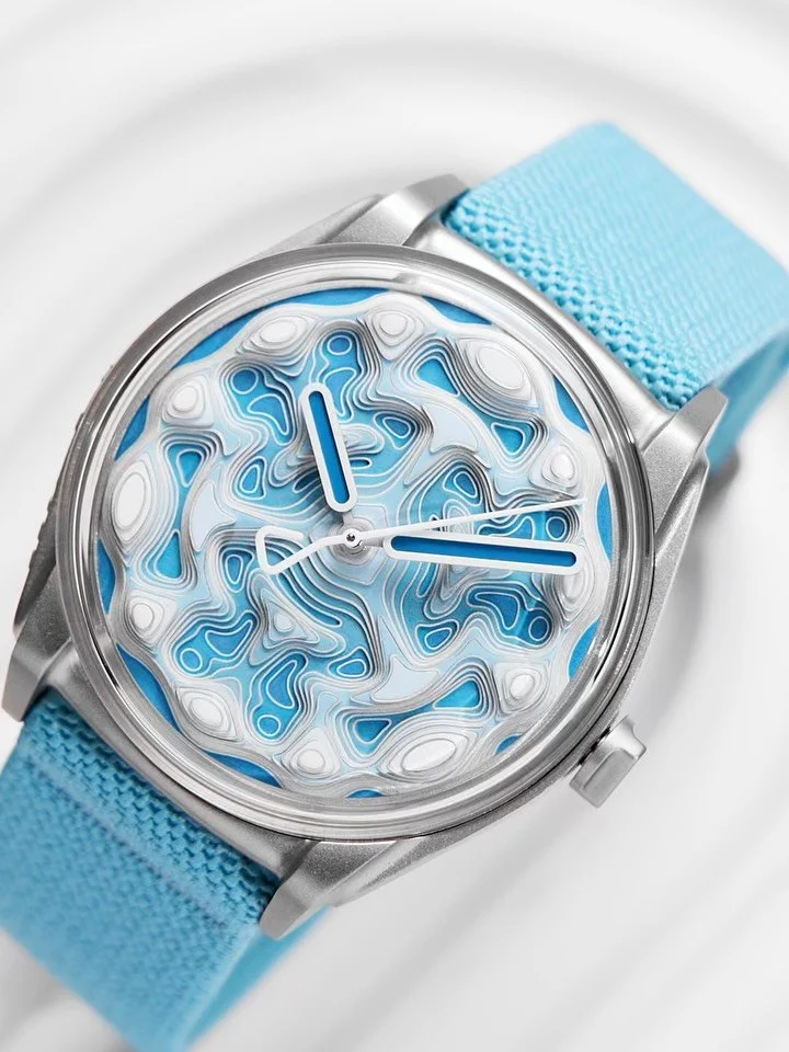 Out of the shadows and into saturated light. ☀️🌊

Introducing Projekt 02 Variant C &mdash; a limited edition of 299 pieces that reimagines Kollokium&rsquo;s topographical dial in a gradient of turquoise blue.

67 hand-painted dial plates. 9 vertical