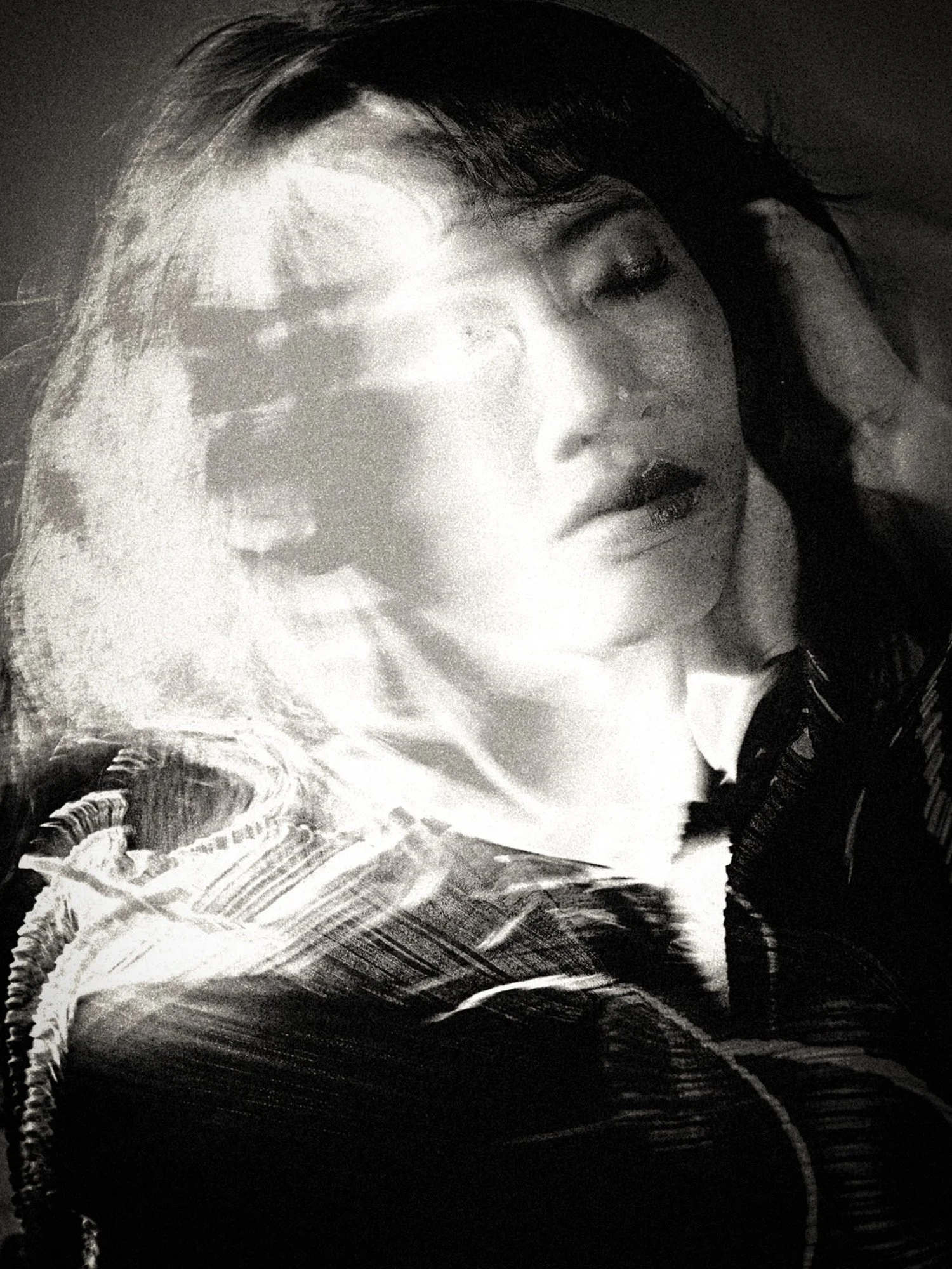 black and white fine art photography, surreal portrait, double exposure portrait, motion blur photography, dreamy portrait, intimate portrait, contemplative photography, analog-inspired grain, shadow and light portrait