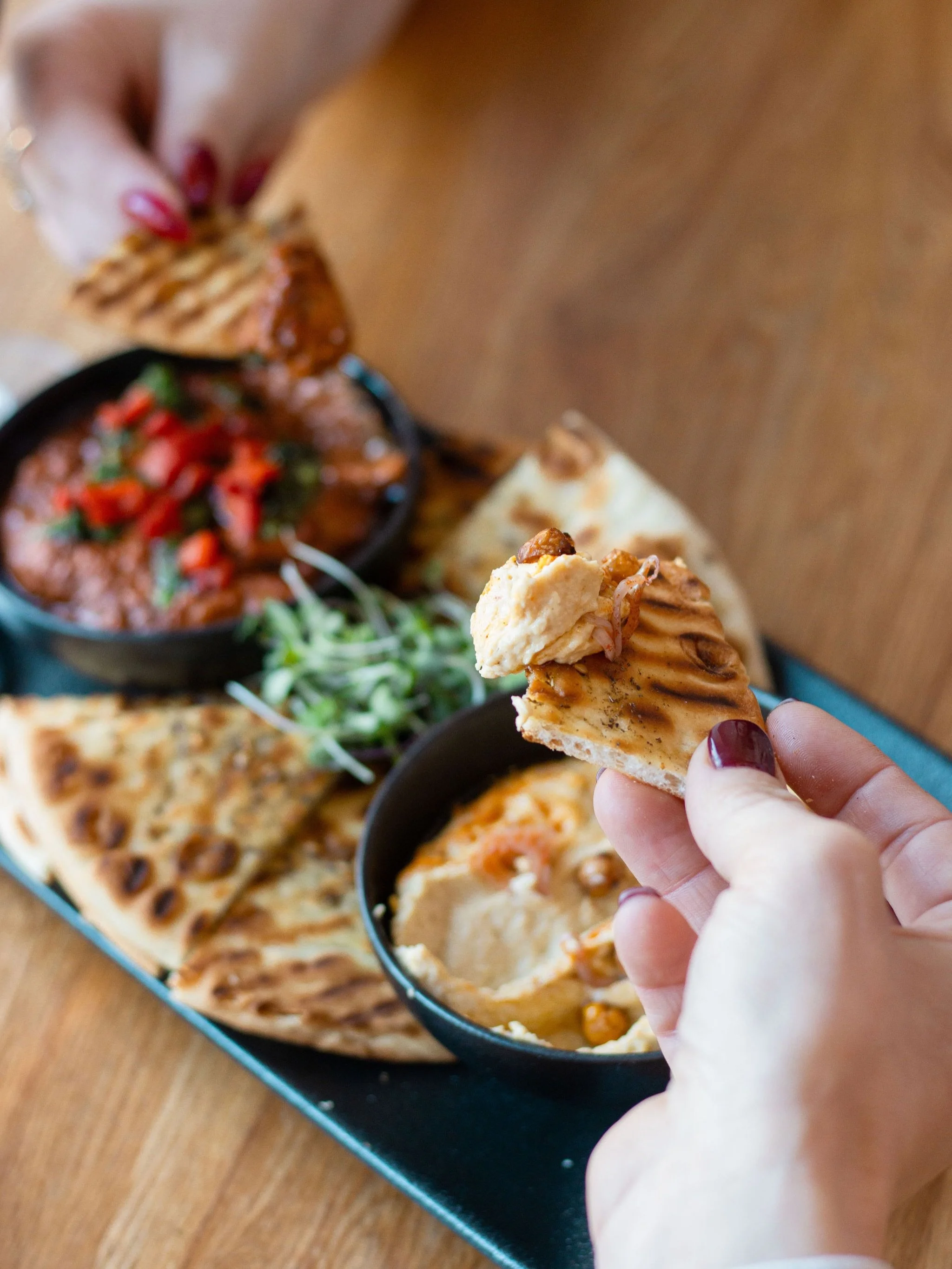 Swipe left for a closer look at this ebb + flow dip duo 🤩

2 dips
Tons of personality

A PK Hummus + Muhammara combo served with za&rsquo;atar flatbread. 

Perfect for the patio, as a snack or appetizer. Come try it.
