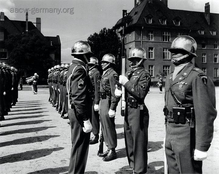 A view of the 7777th (Inf) Honor Guard Platoon as they stand an inspection by a T/Sgt of the platoon. Frankfurt, Germany, July 16, 1948 (NARA).