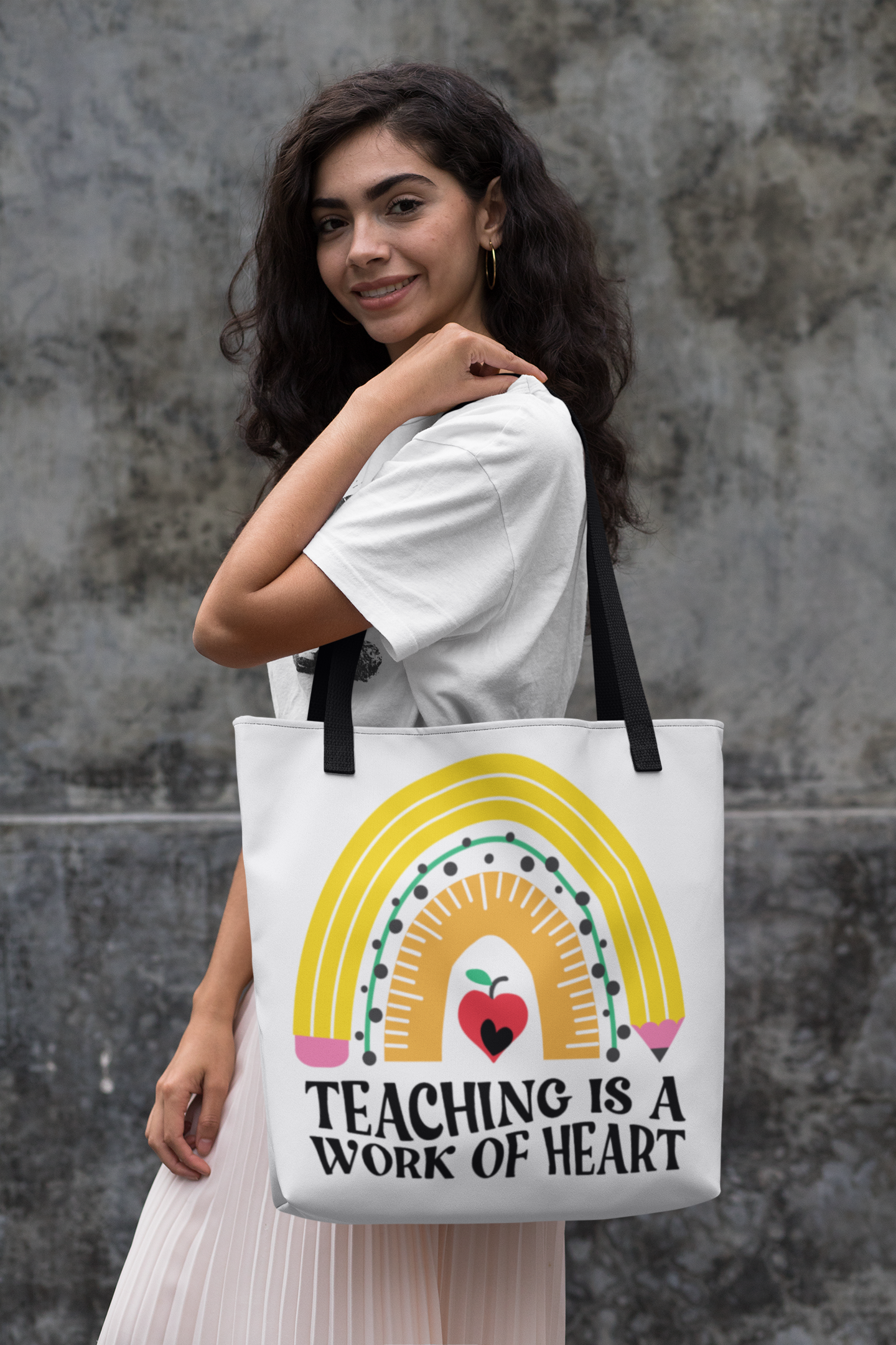 tote-bag-mockup-of-a-woman-in-front-of-a-concrete-wall-29448.png