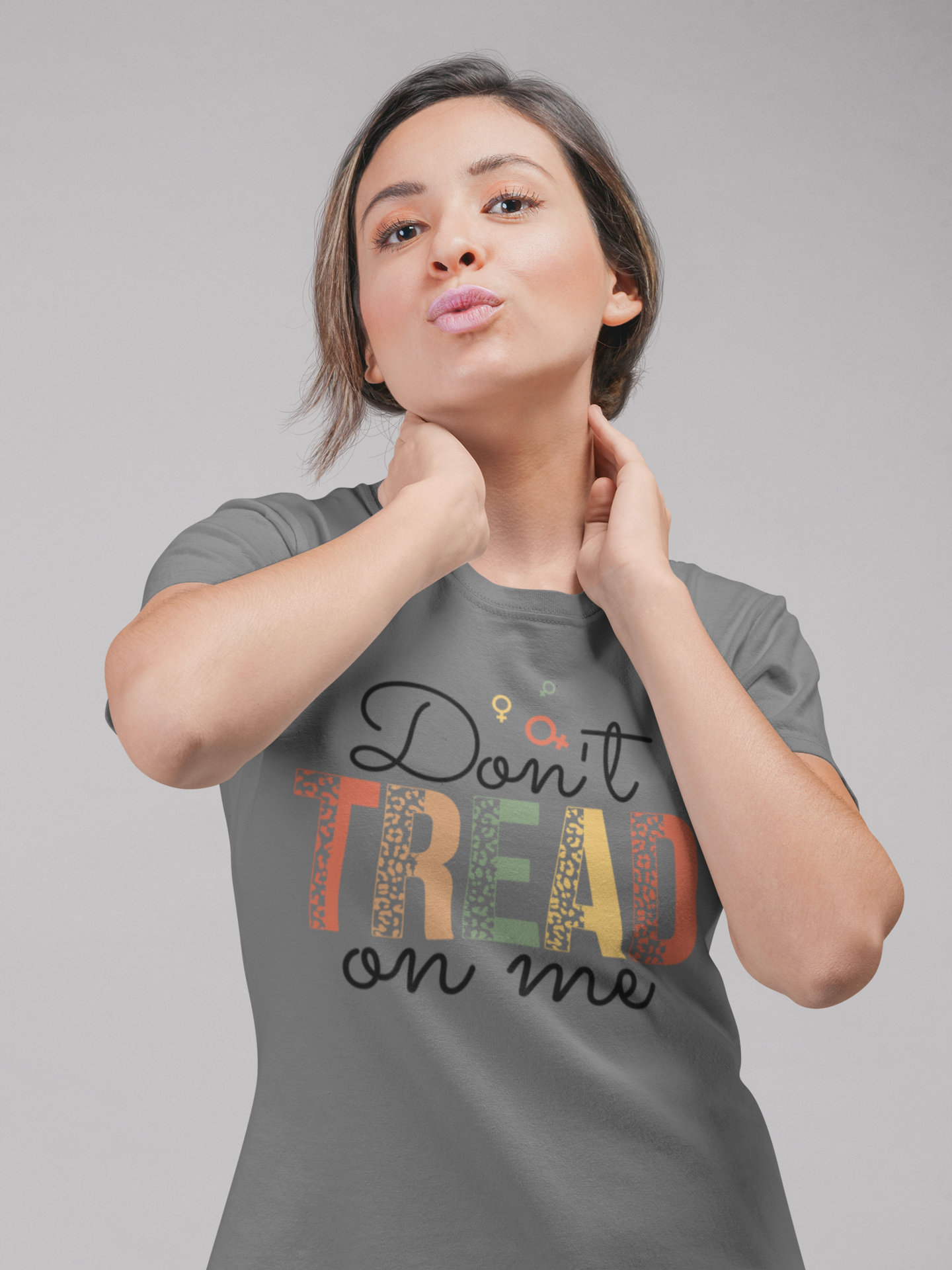 mockup-featuring-a-woman-wearing-a-round-neck-tshirt-while-at-a-studio-22338.png