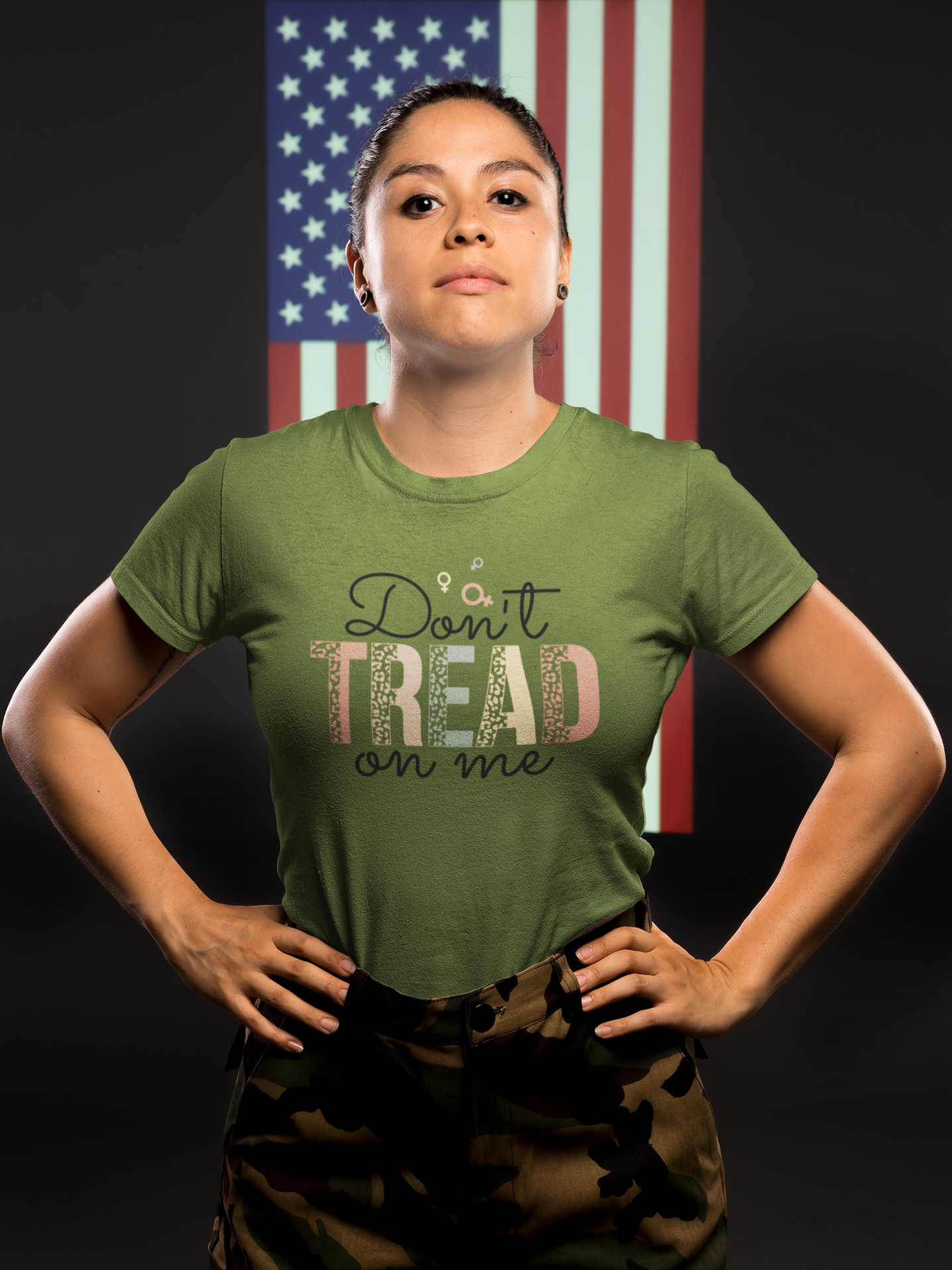 t-shirt-mockup-of-a-woman-veteran-standing-against-an-american-flag-21215.png