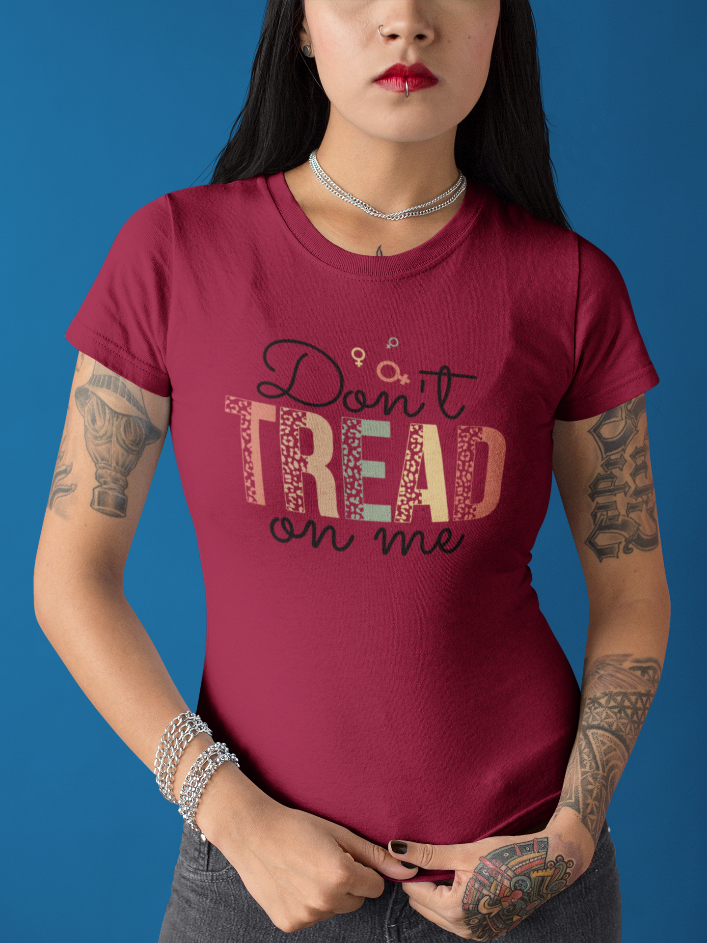 tattooed-girl-mockup-standing-while-wearing-a-round-neck-tee-against-a-solid-color-background-a17178.png