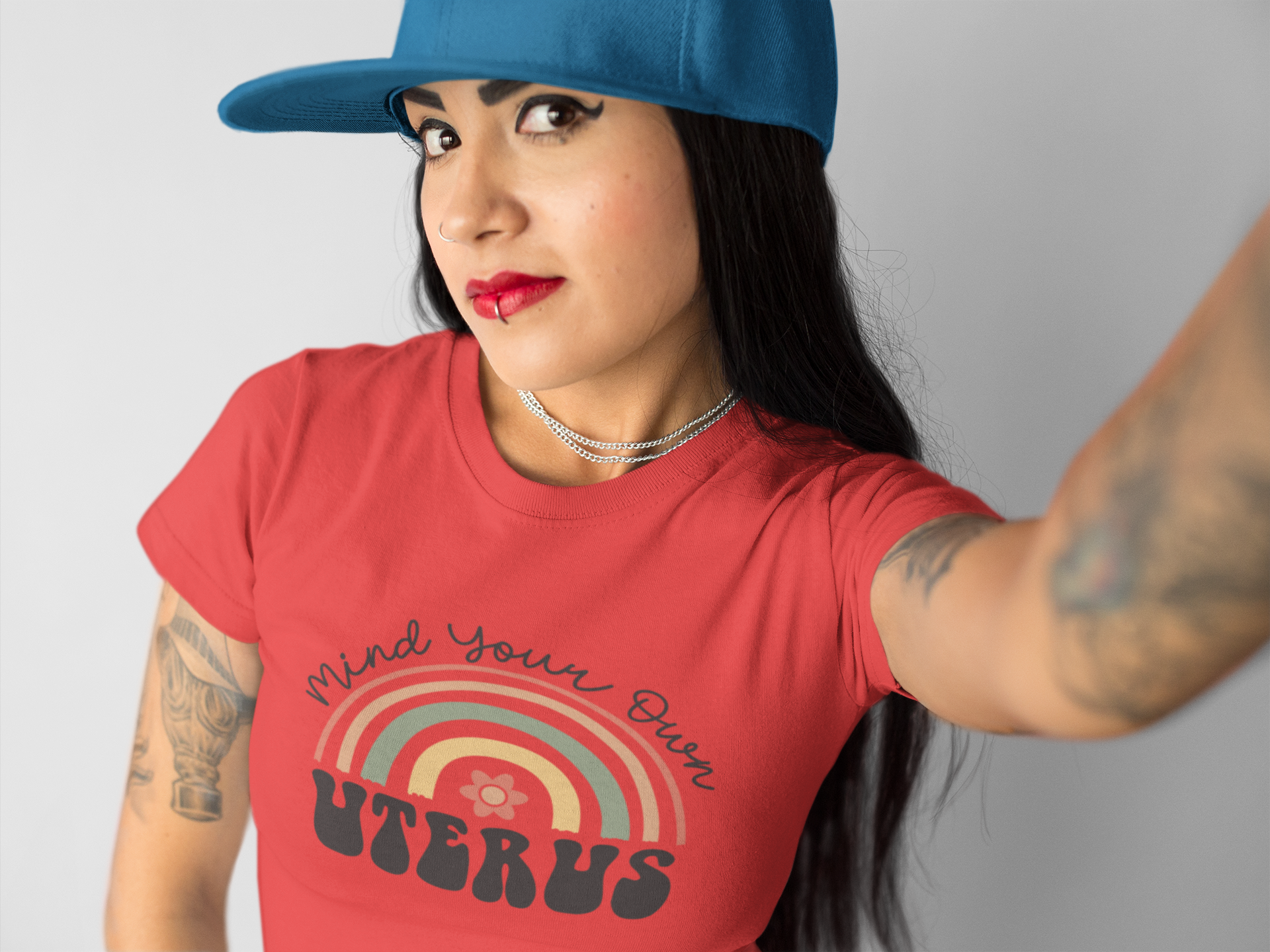 selfie-of-a-girl-wearing-a-round-neck-t-shirt-mockup-and-a-hat-against-a-solid-color-wall-a17180.png