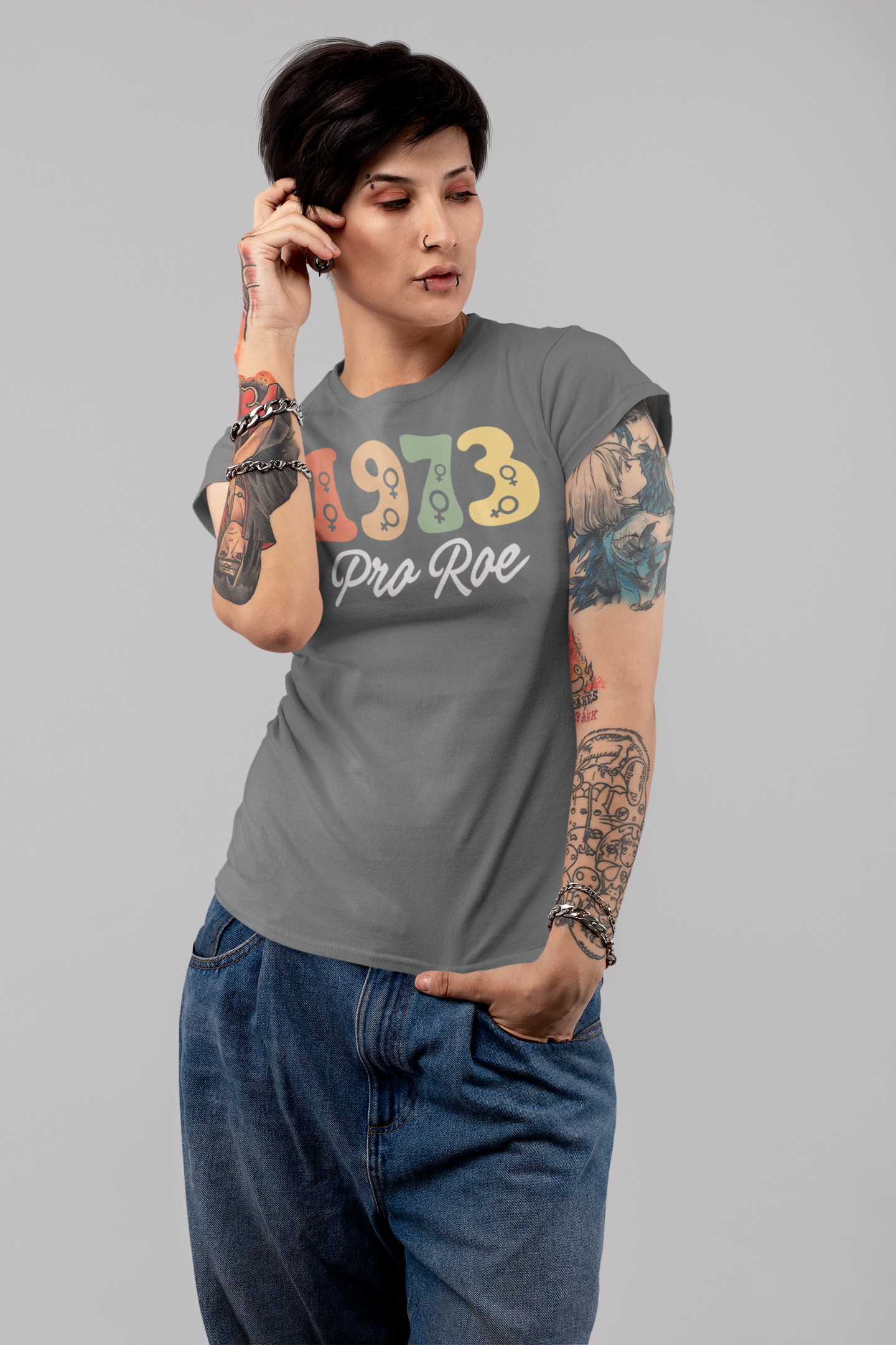 t-shirt-mockup-featuring-a-tattooed-woman-with-an-androgynous-look-at-a-studio-32924.png