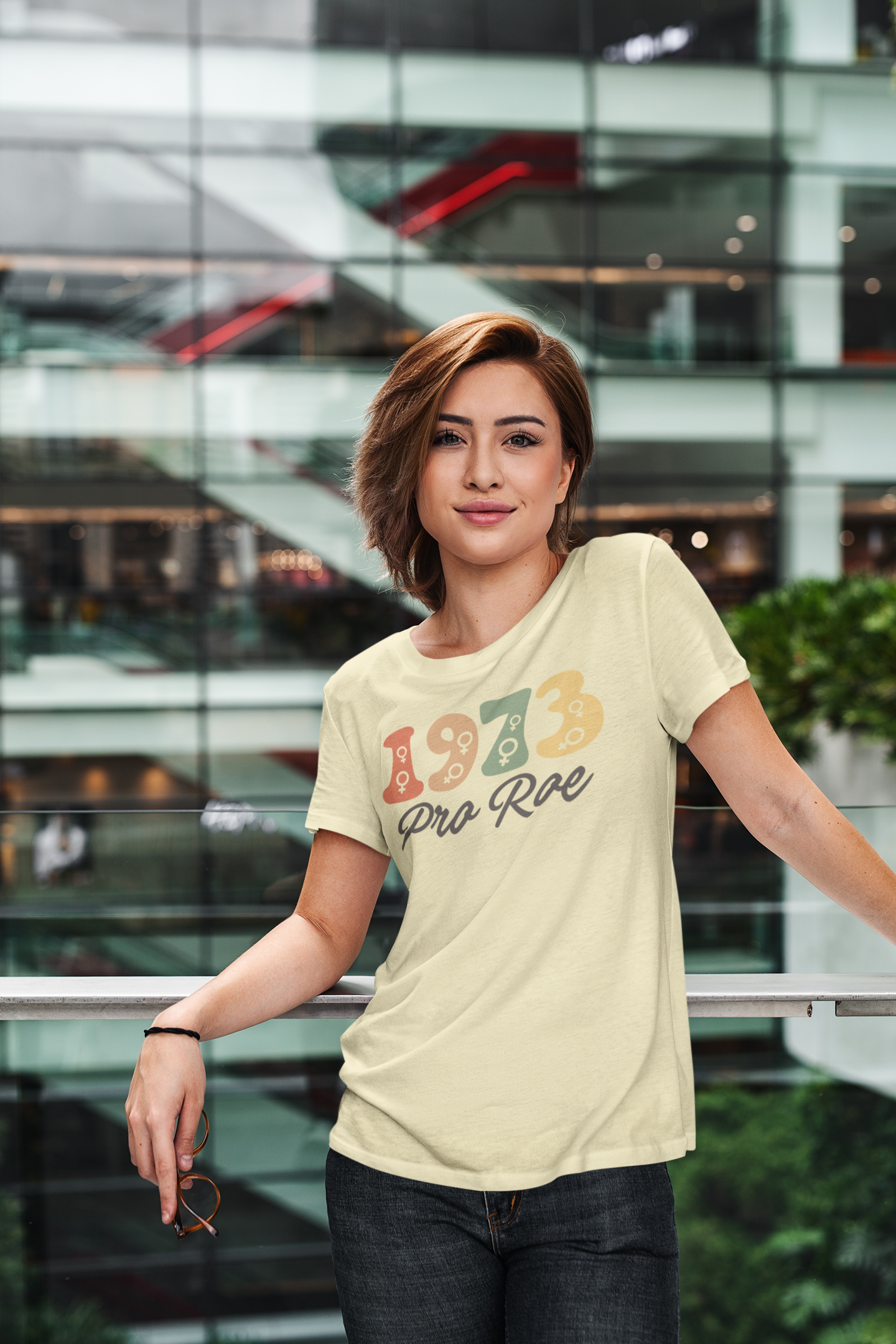 t-shirt-mockup-of-a-cool-woman-in-a-modern-building-414-el.png